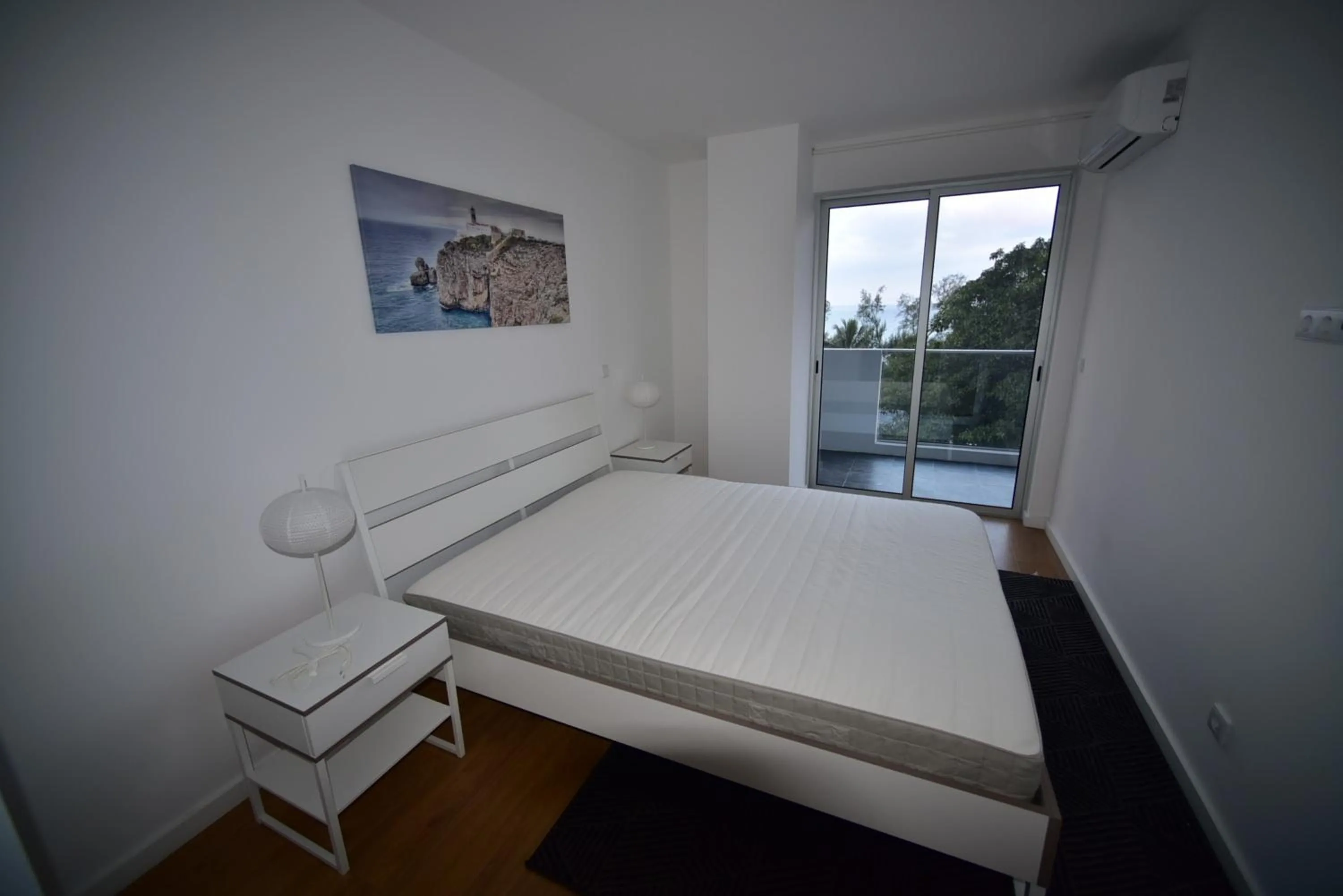 Bed in Xenon Urban Apartments