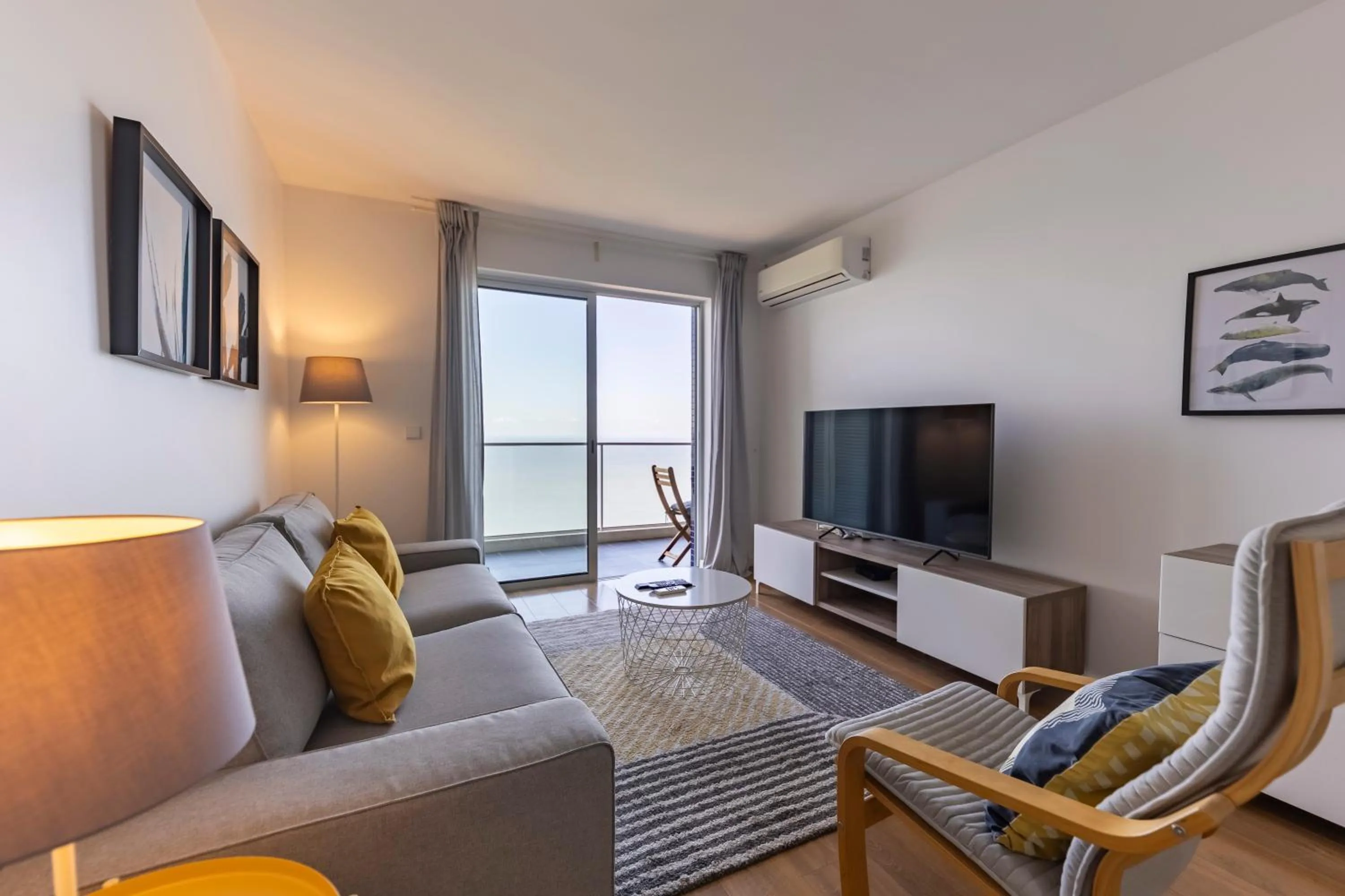 Communal lounge/ TV room in Xenon Urban Apartments