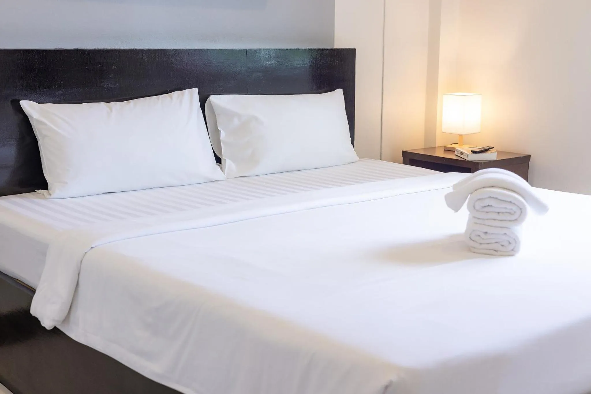 Bed in Baan Yuyen Karon Guesthouse