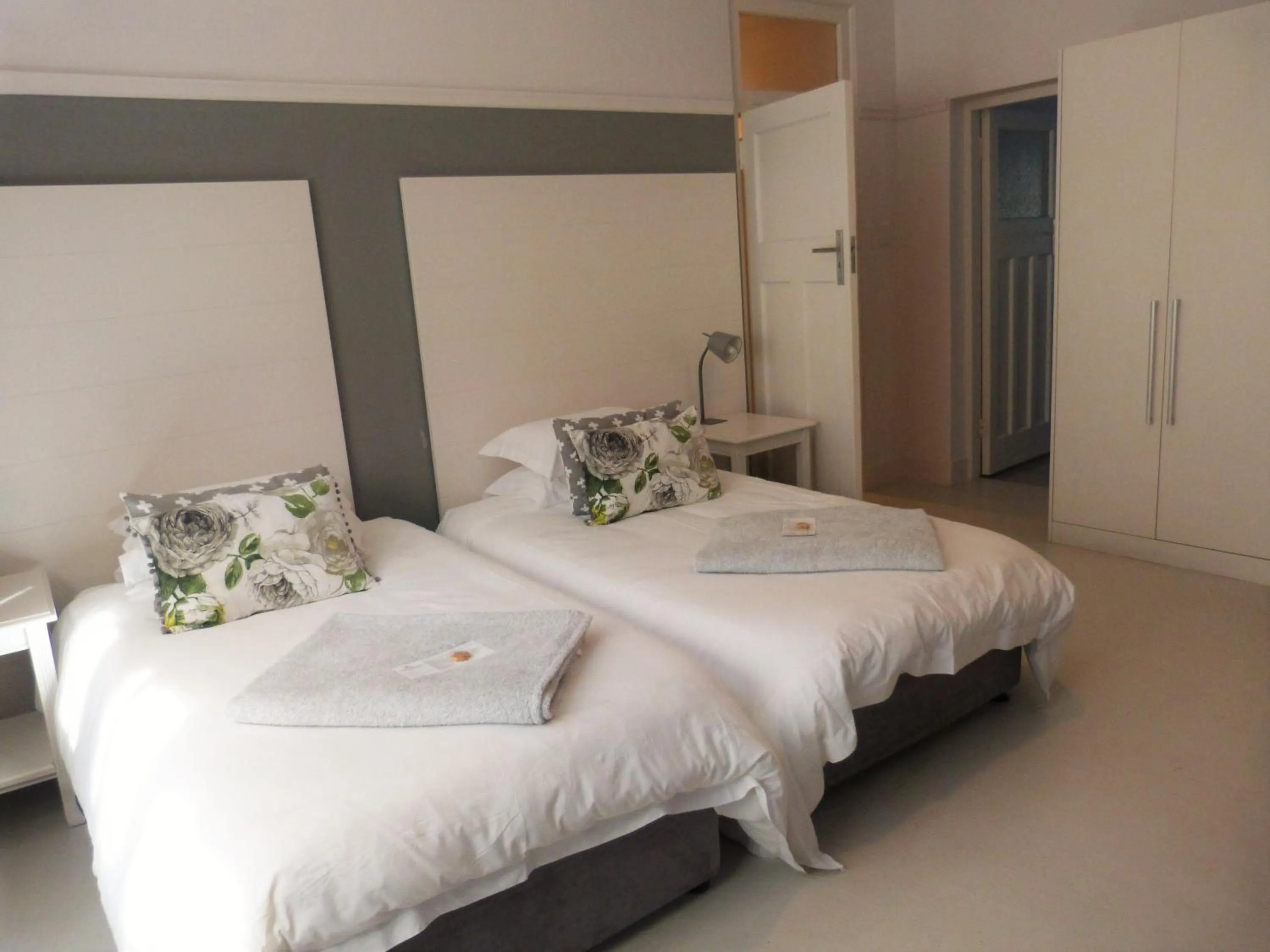 Bed in The Hampton Exclusive Guesthouse