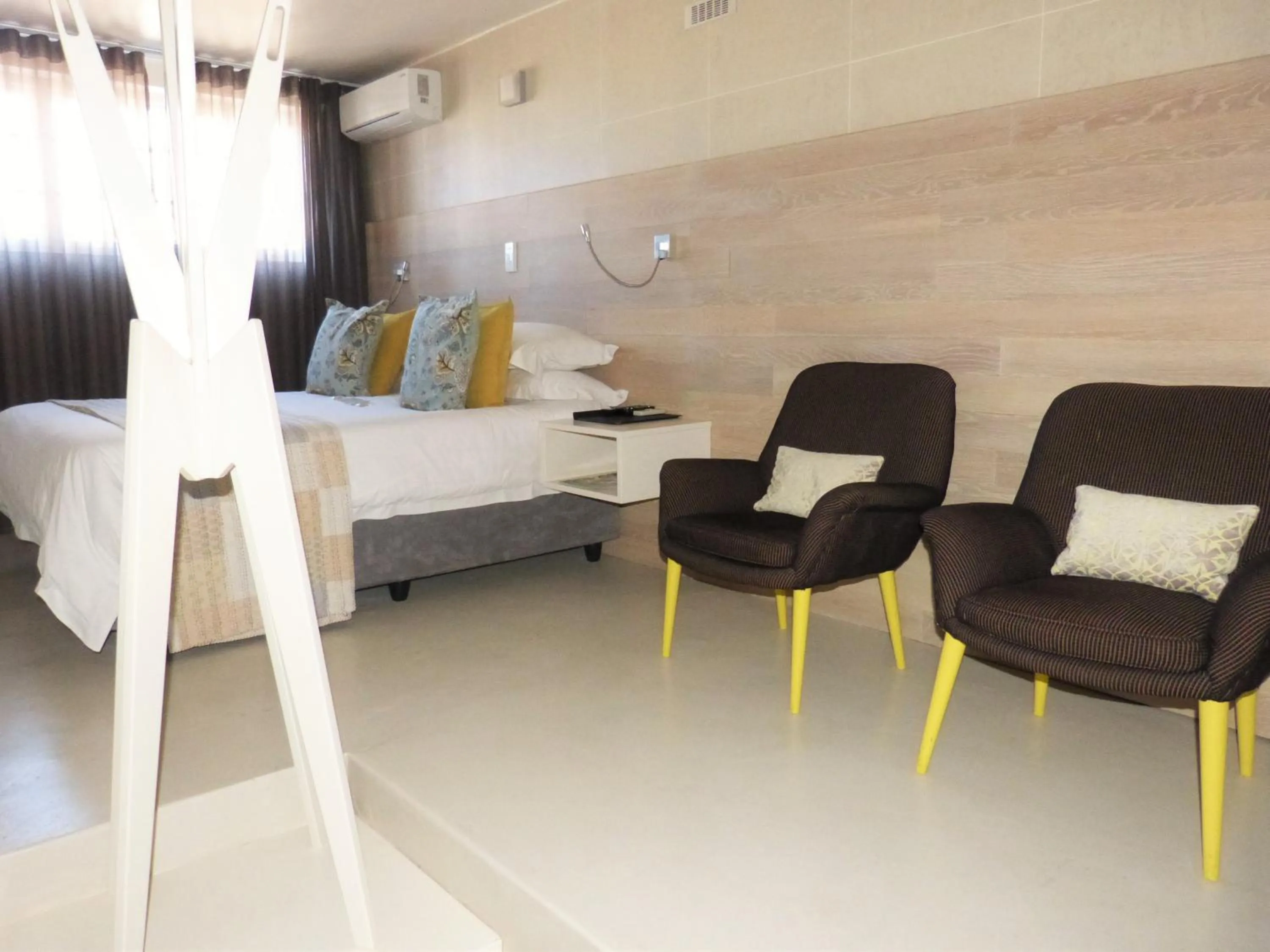 Bed in The Hampton Exclusive Guesthouse