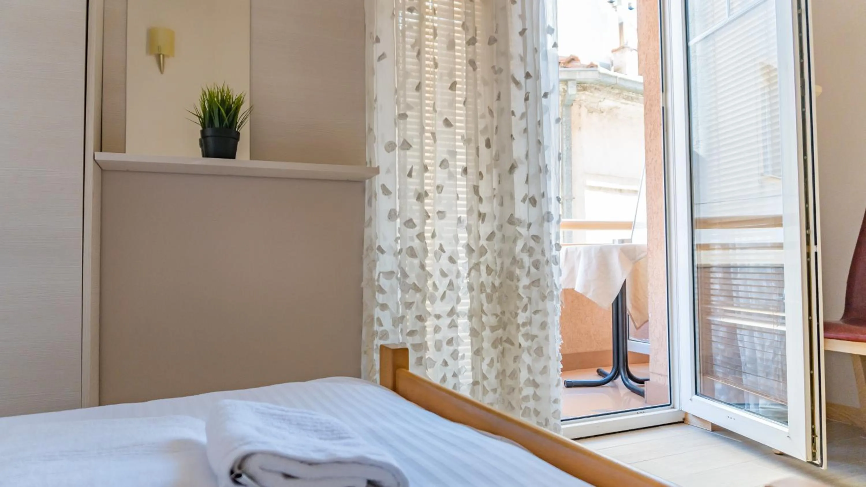 Bed in Di Angolo Apartments