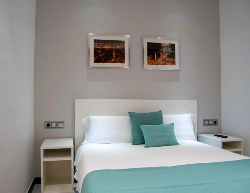 Photo of the whole room, Bed in Hostal Apolo