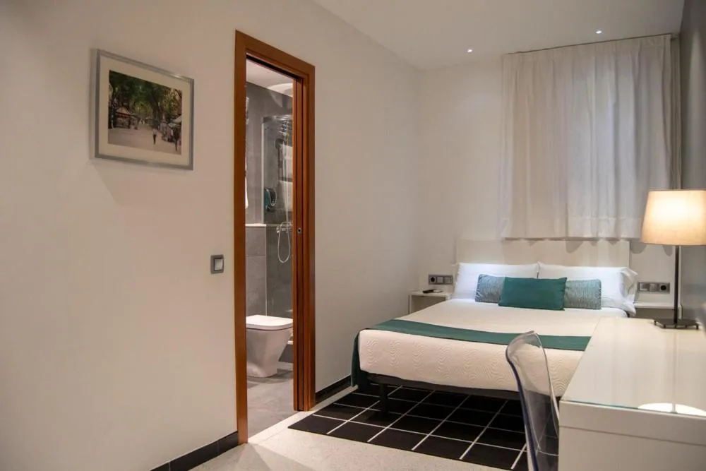 Photo of the whole room, Bed in Hostal Apolo