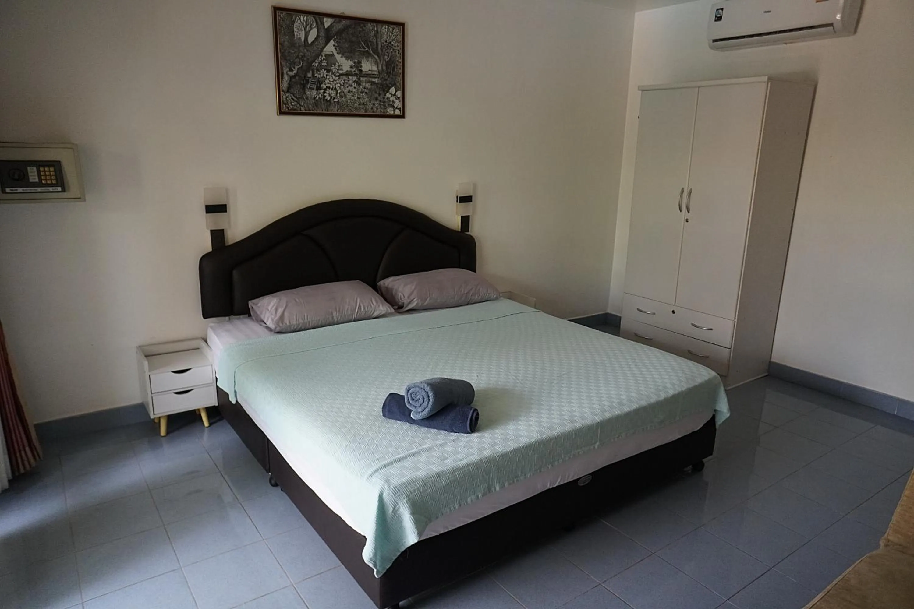 Bed in Udon Thai House Resort & Hotel