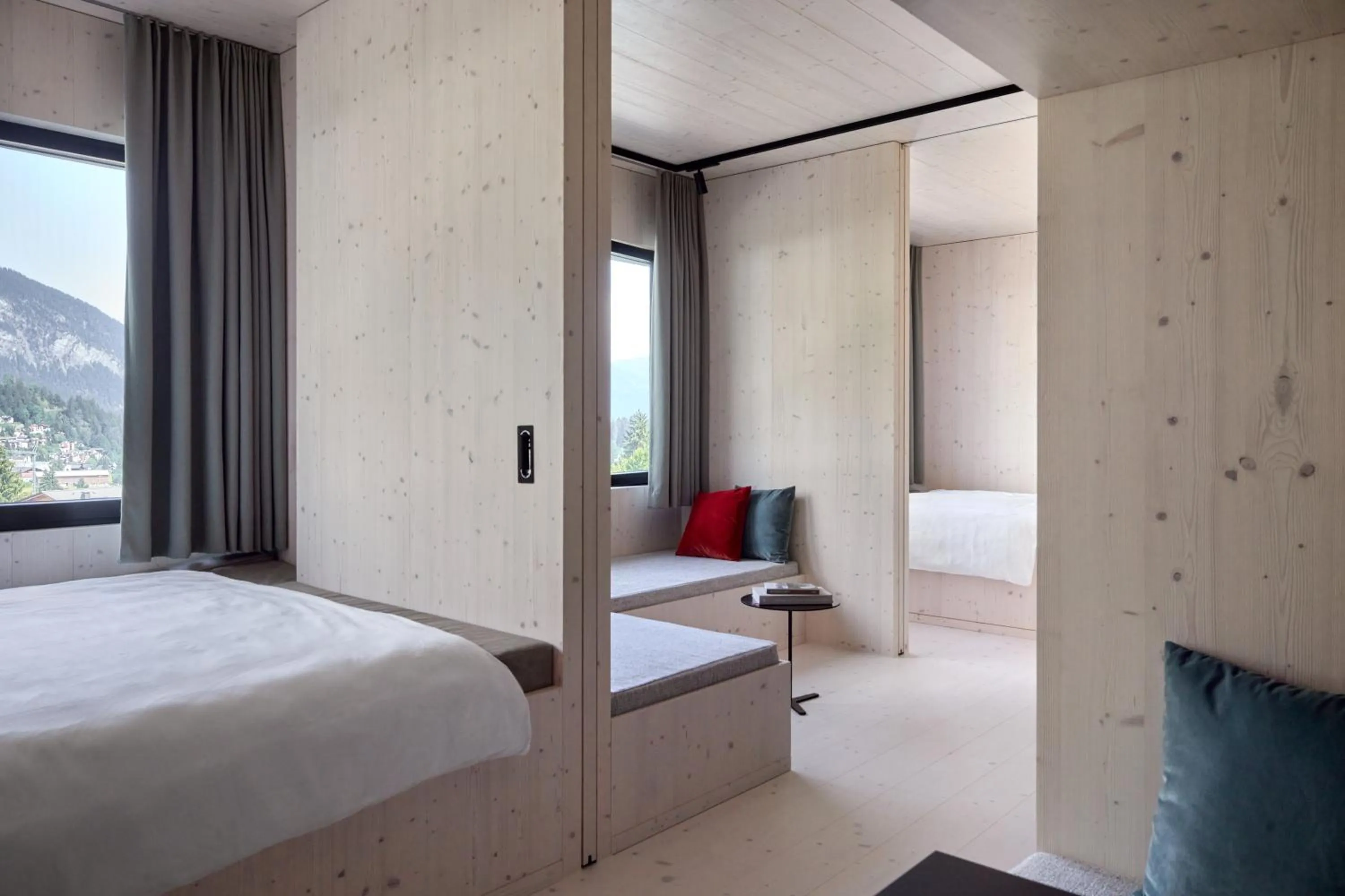 Living room, Bed in Me and All Hotel Flims, by Hyatt