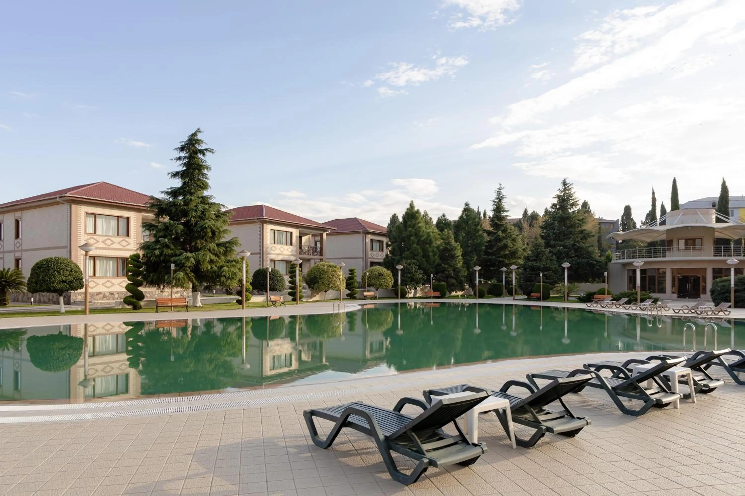 Swimming pool in Ramada Plaza by Wyndham Gence