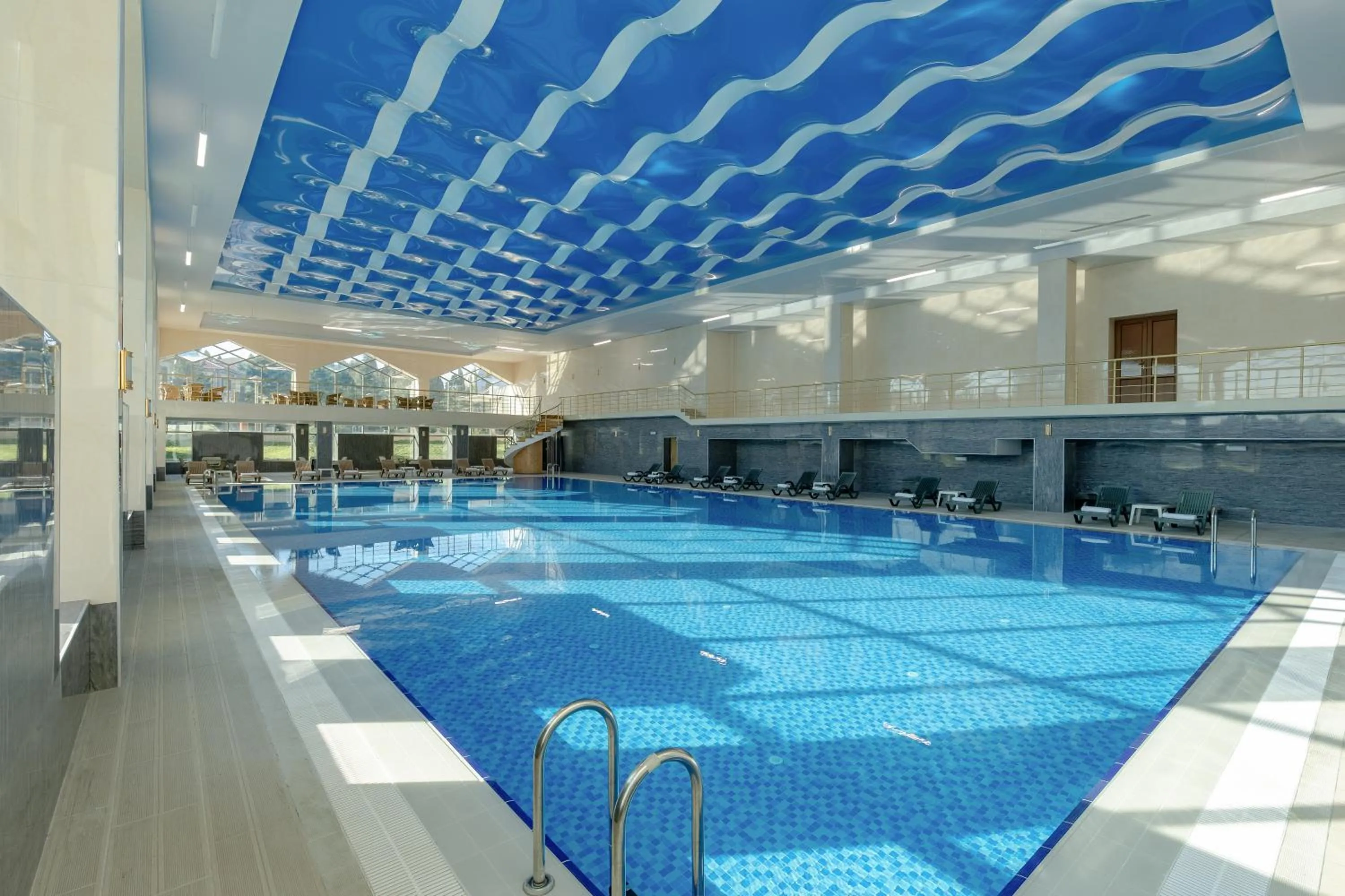 Swimming pool in Ramada Plaza by Wyndham Gence