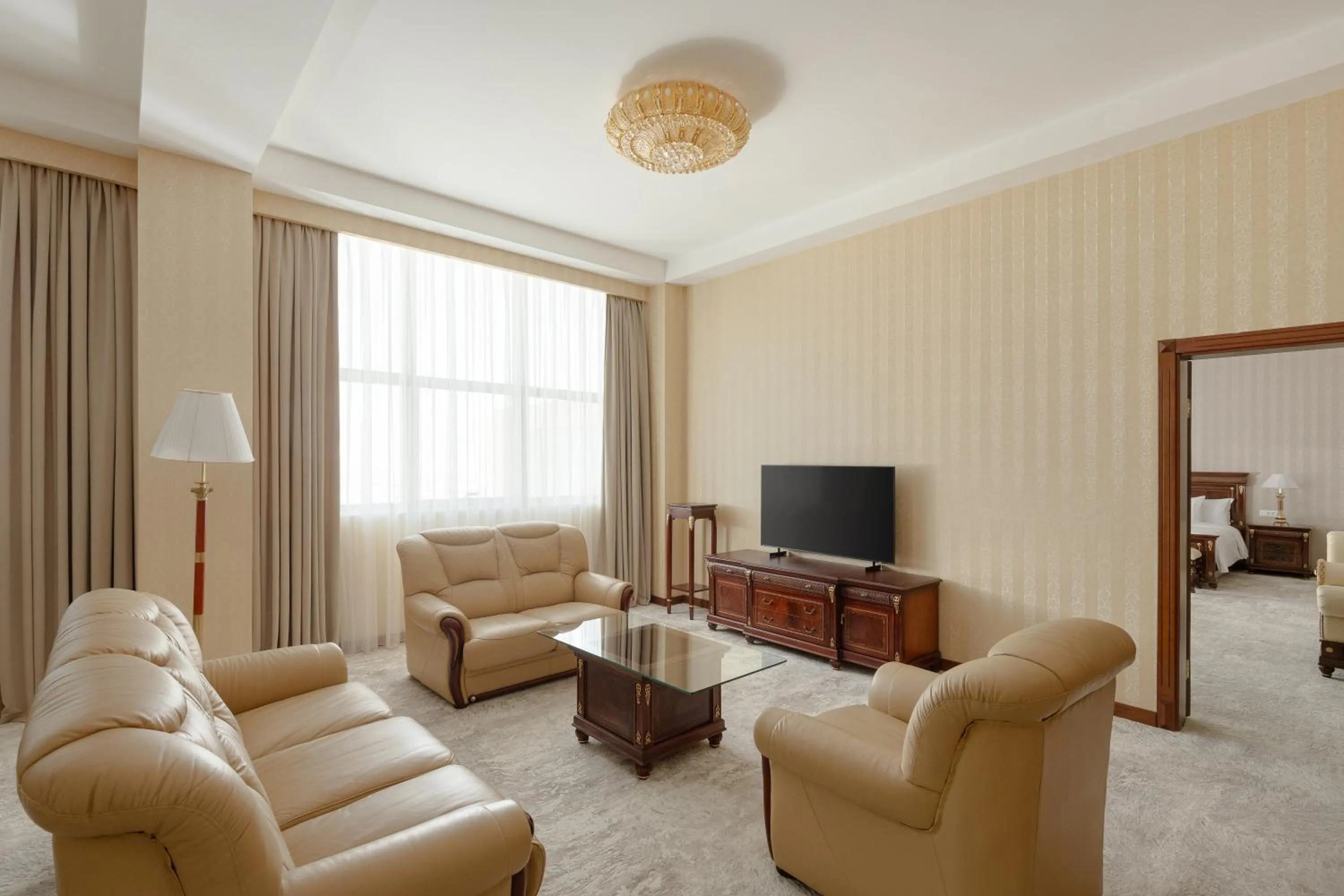 Living room in Ramada Plaza by Wyndham Gence