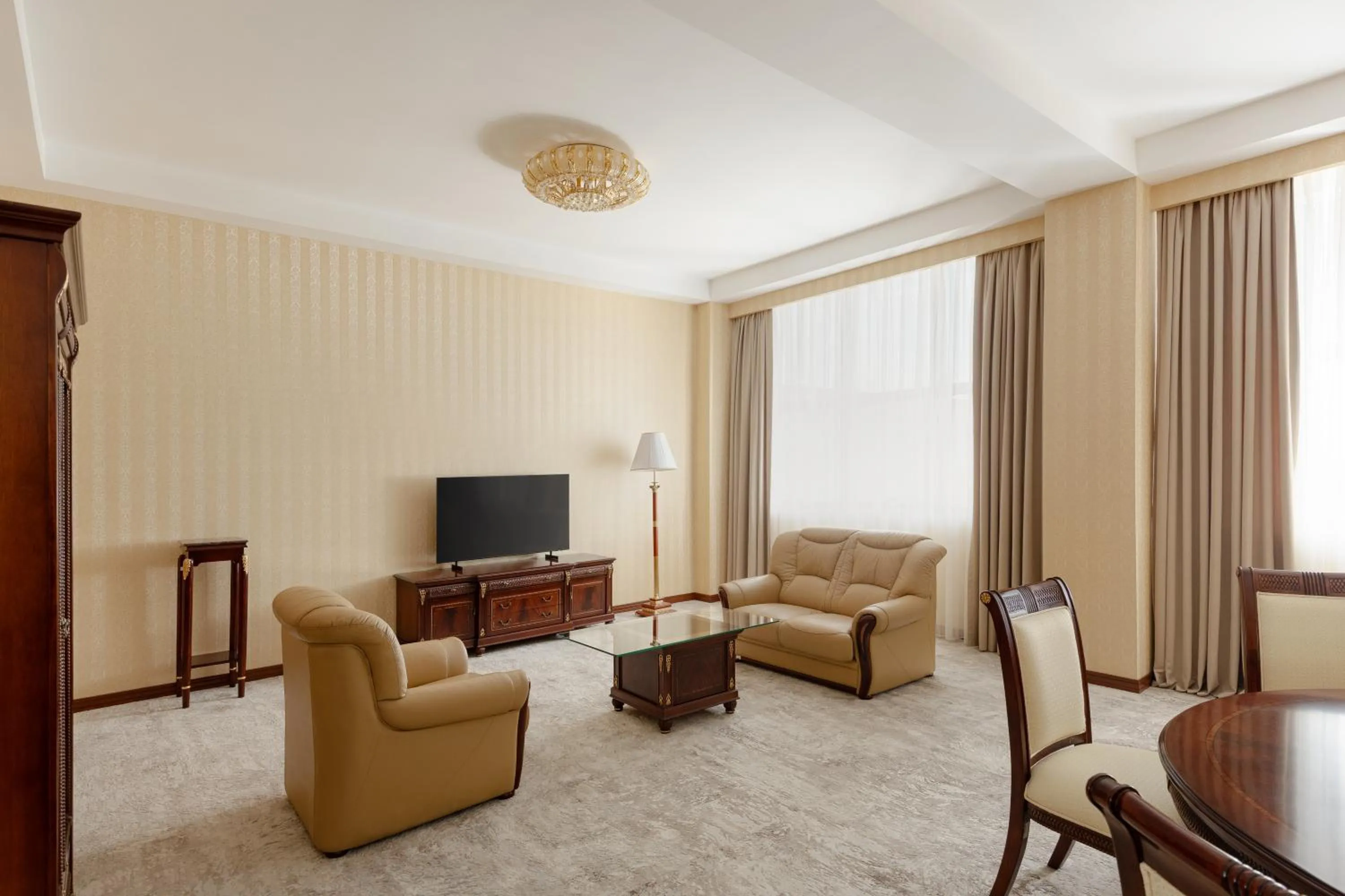 Living room in Ramada Plaza by Wyndham Gence