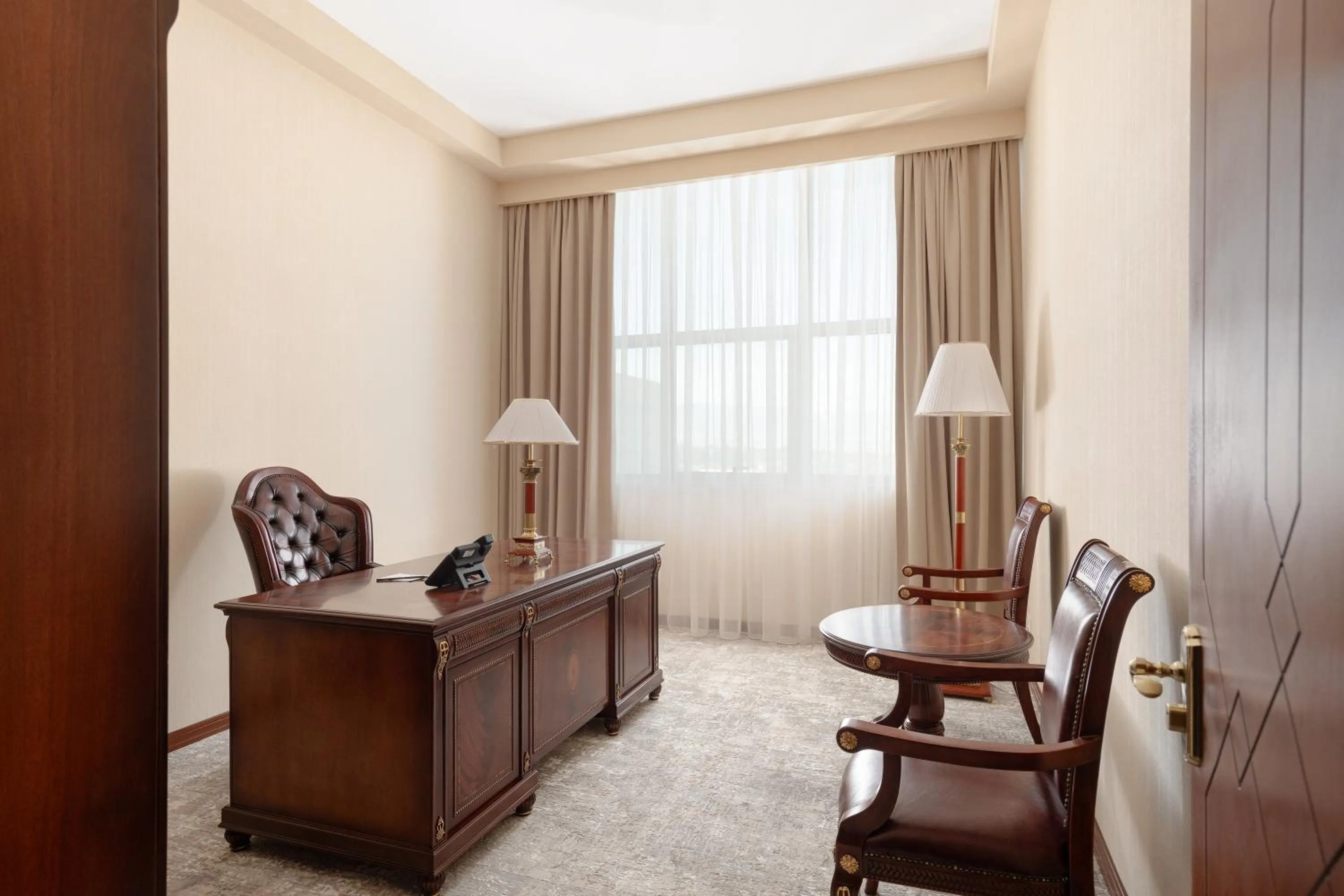 Seating area in Ramada Plaza by Wyndham Gence