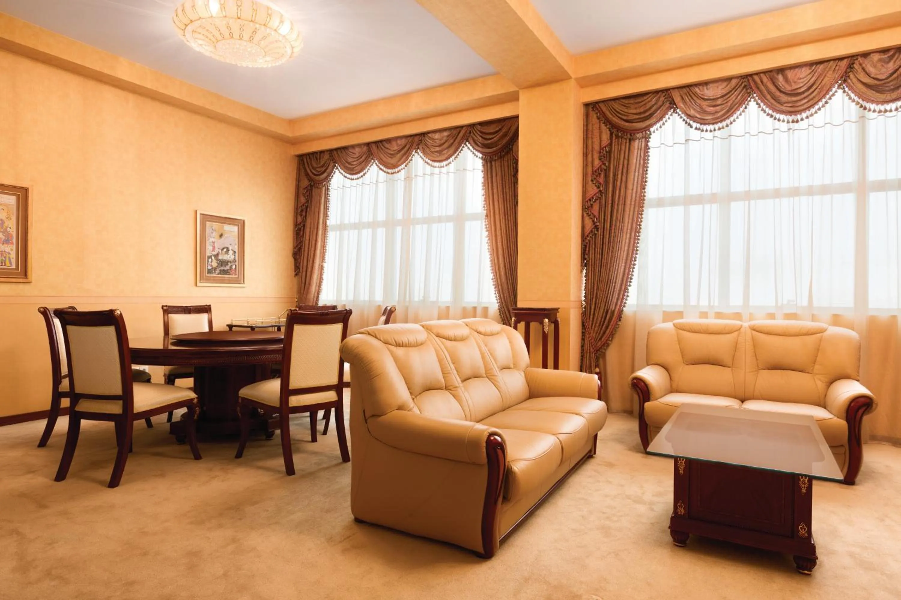 Living room in Ramada Plaza by Wyndham Gence