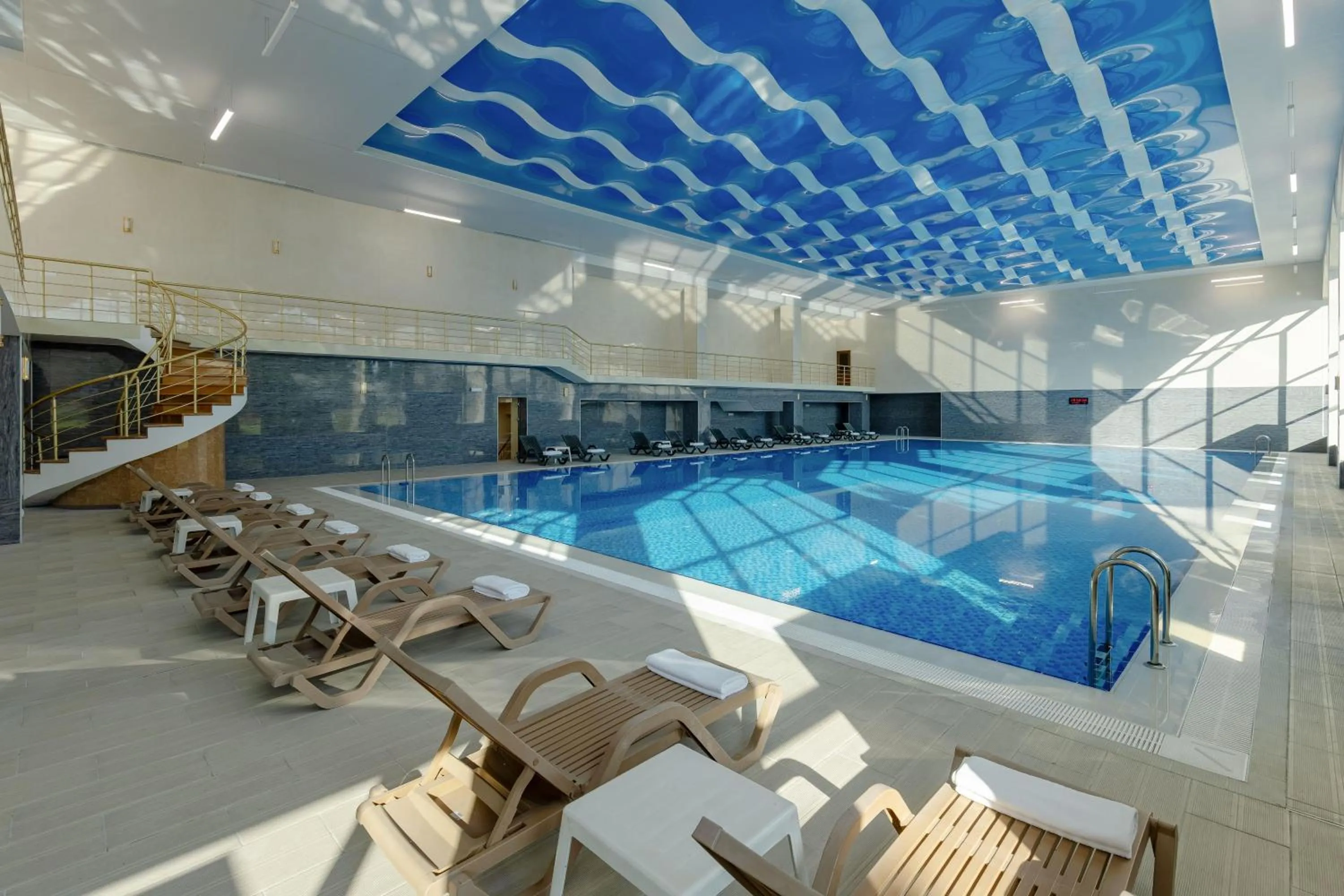 Swimming pool in Ramada Plaza by Wyndham Gence