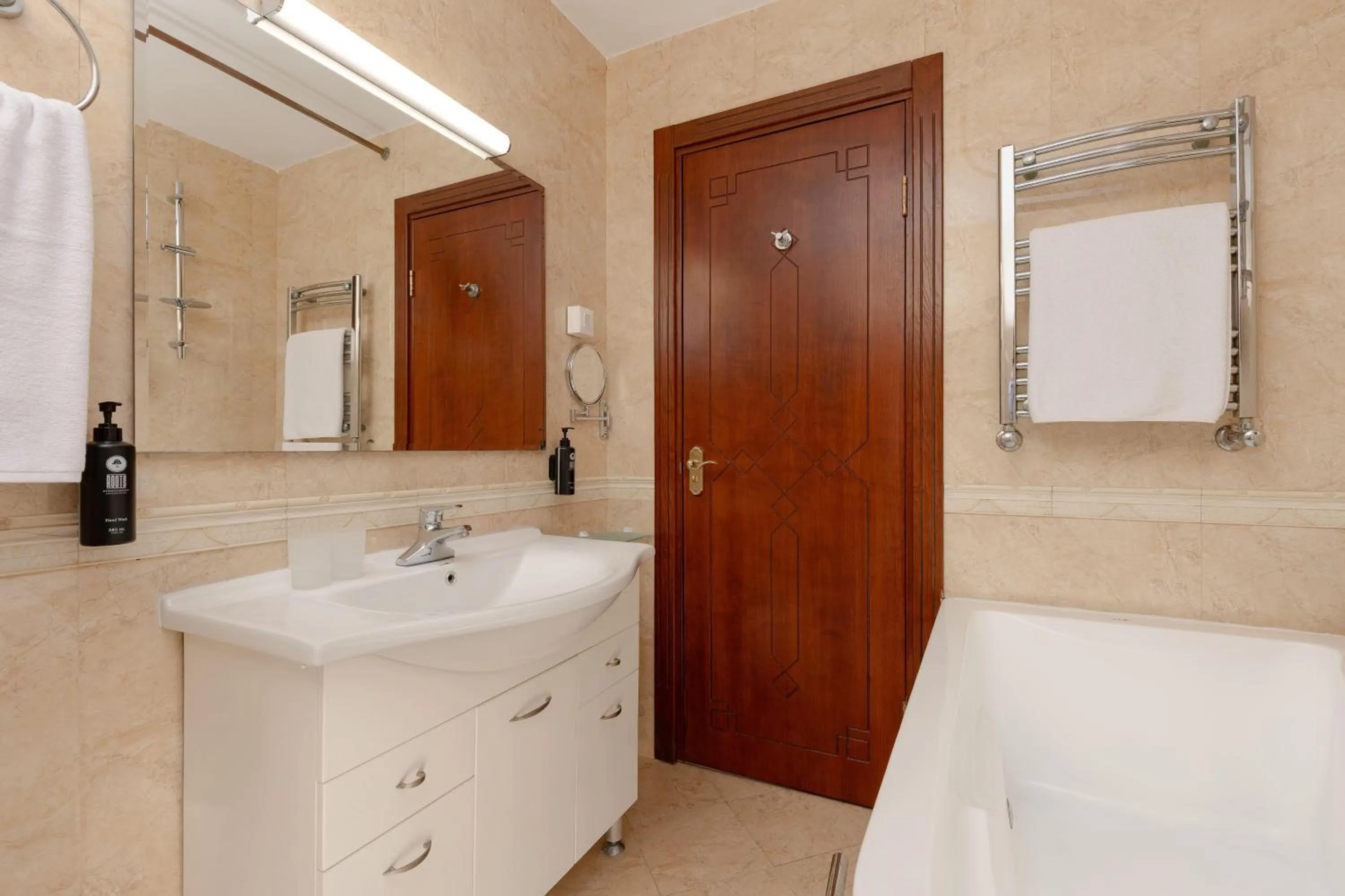 Bathroom in Ramada Plaza by Wyndham Gence