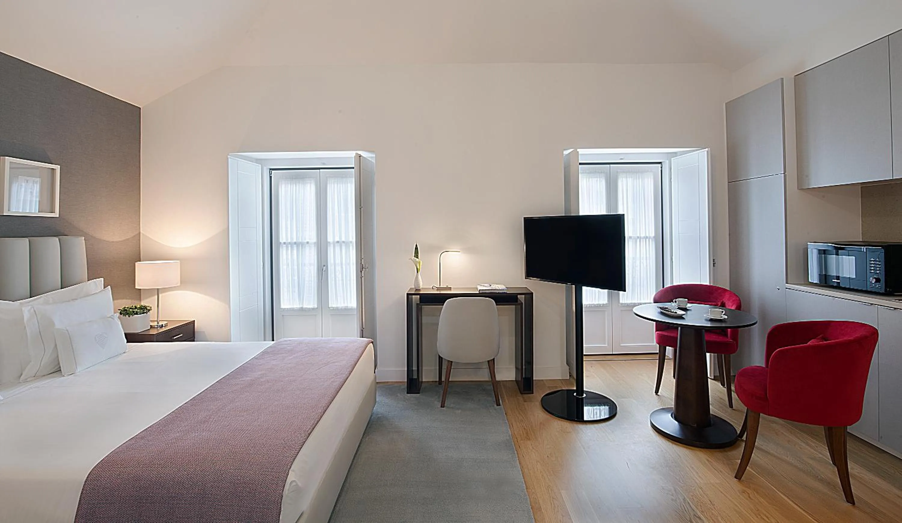 Bed in Grape Harbor Prata Apartments