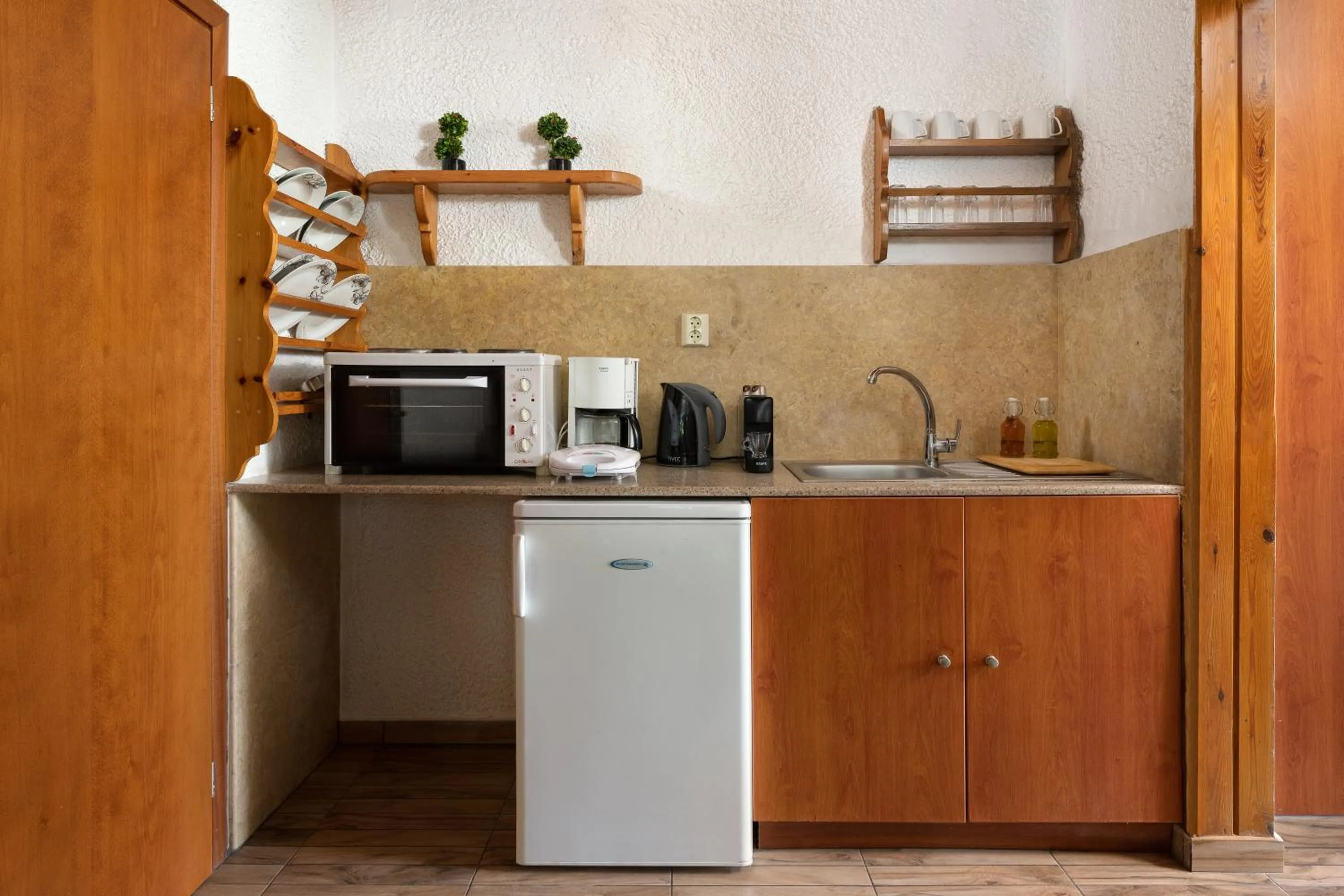 Kitchen or kitchenette in Elefteria Apts & Suites