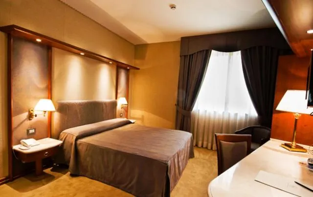 Photo of the whole room, Bed in L'Isola Di Aurora