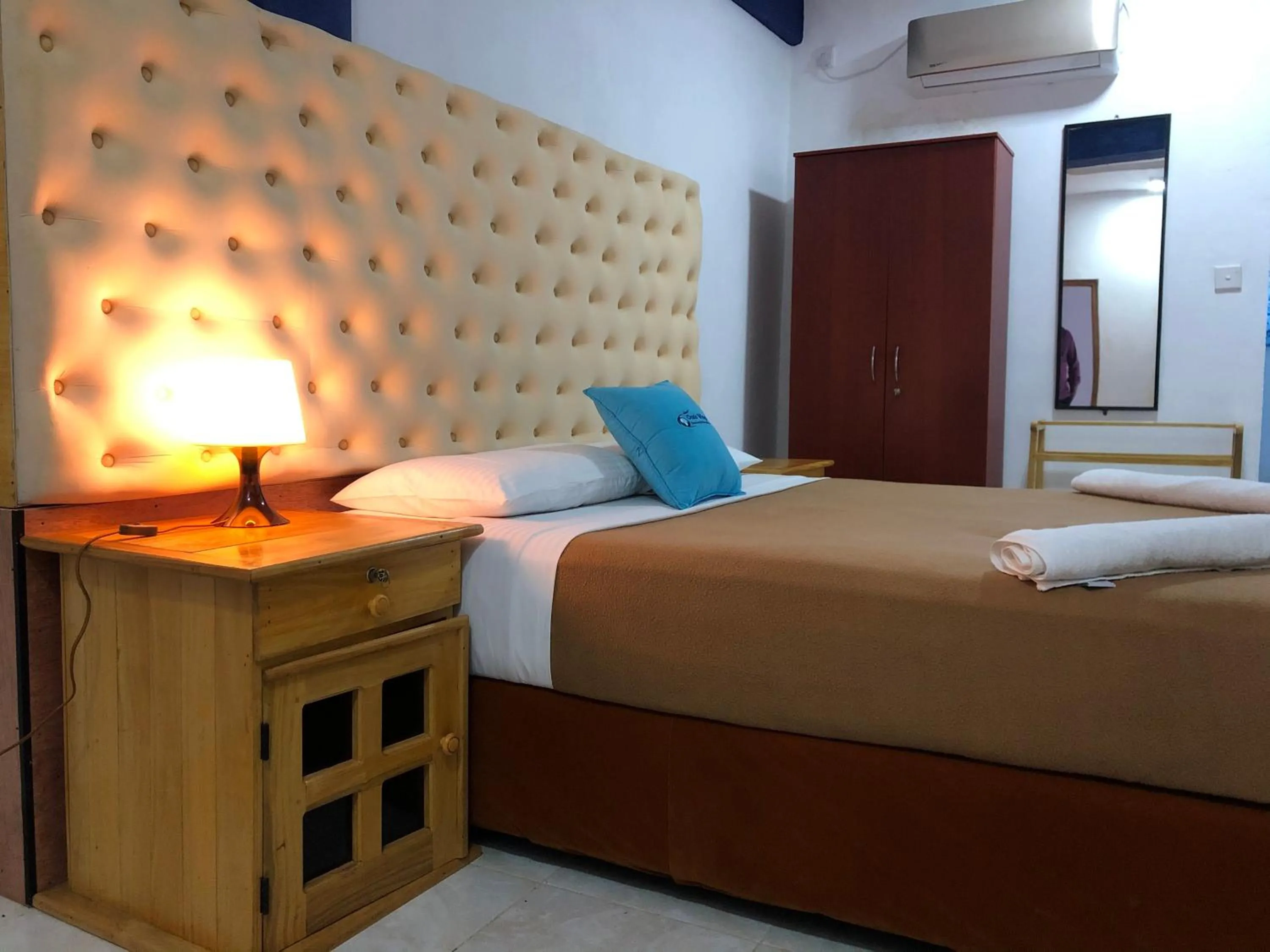 Bed in Oasis Wings Hotel