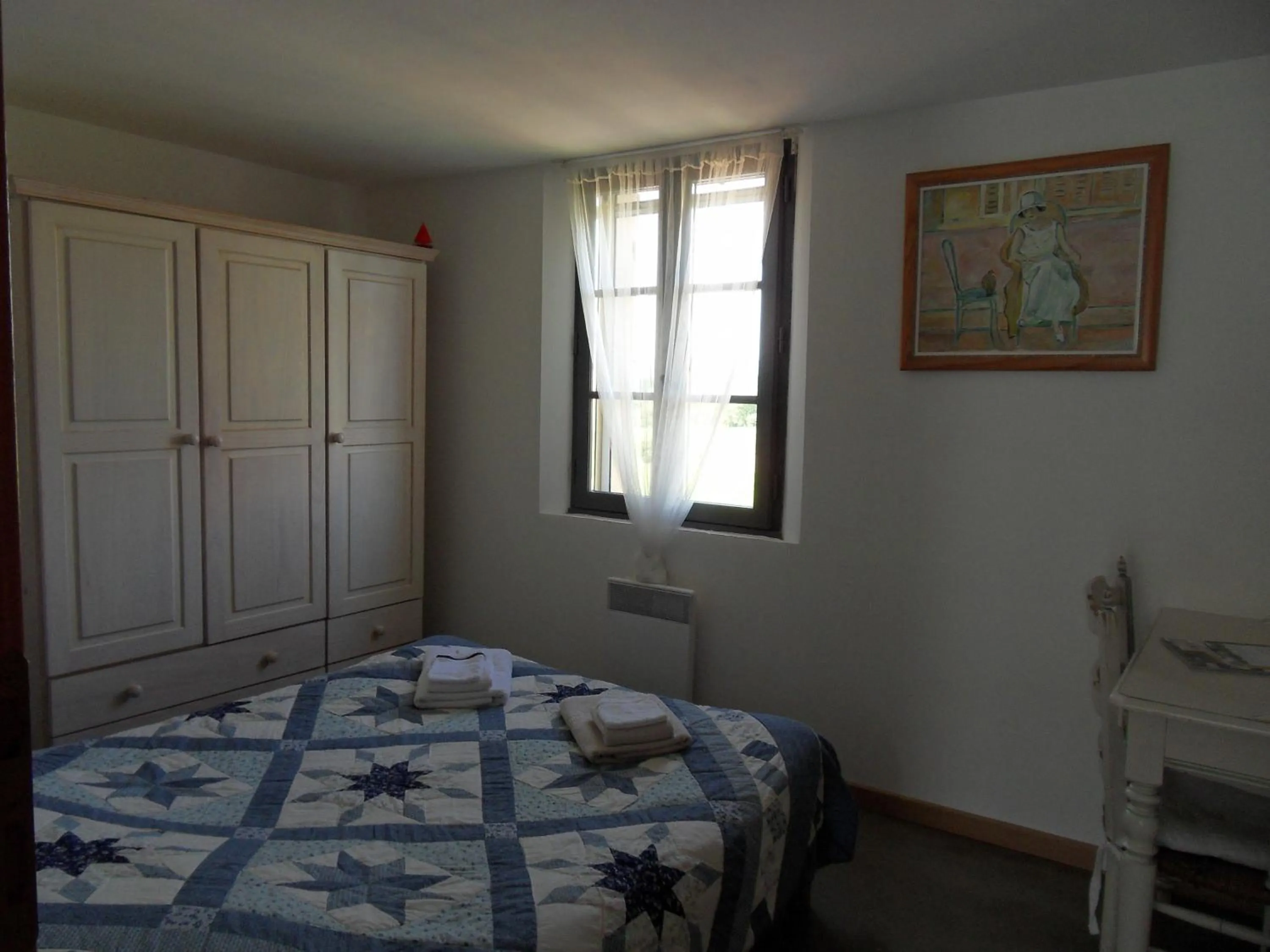 Photo of the whole room, Bed in Le Jardin d'Ivana