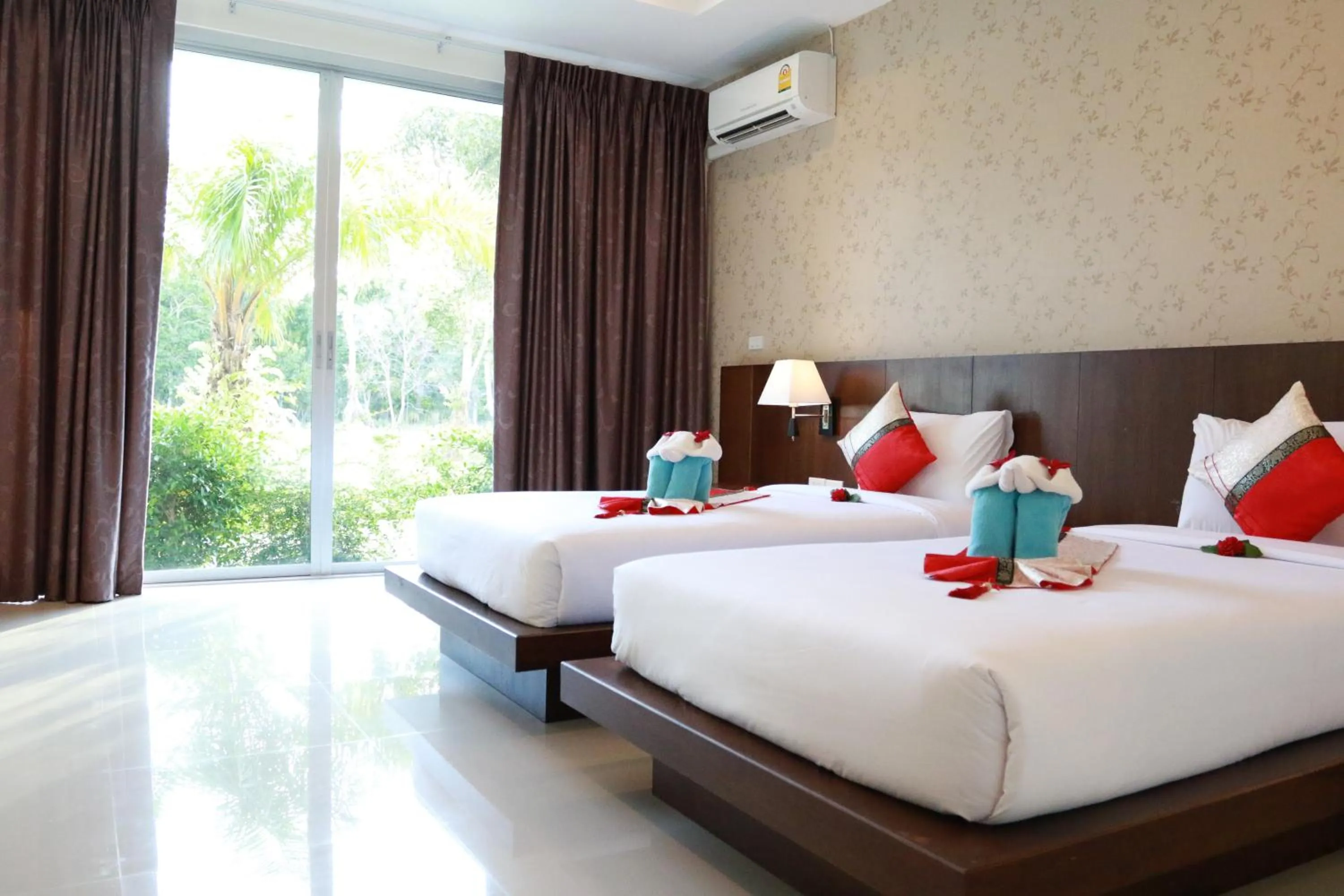Bed in The Pano Hotel & Residence
