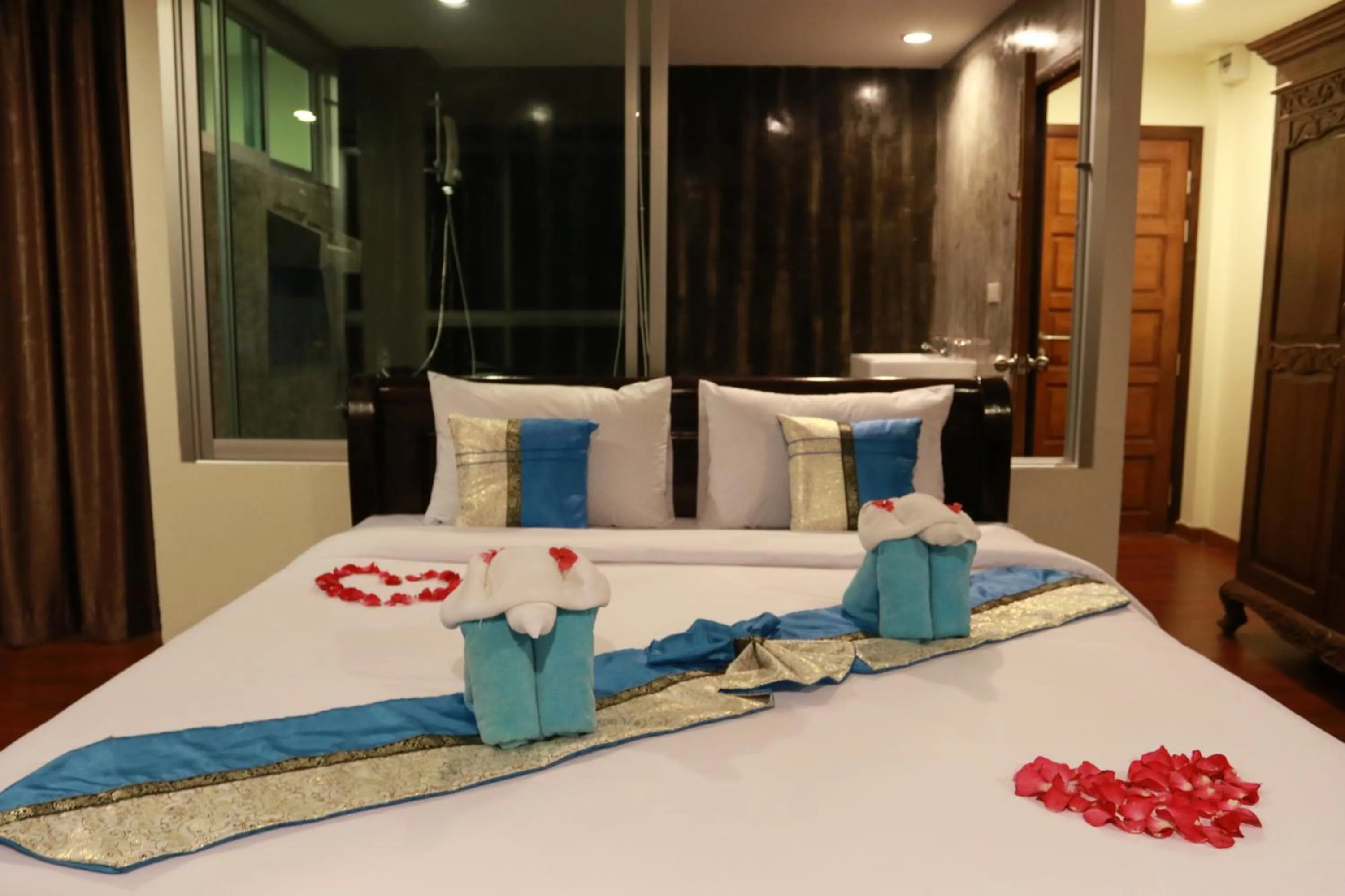 Bed in The Pano Hotel & Residence