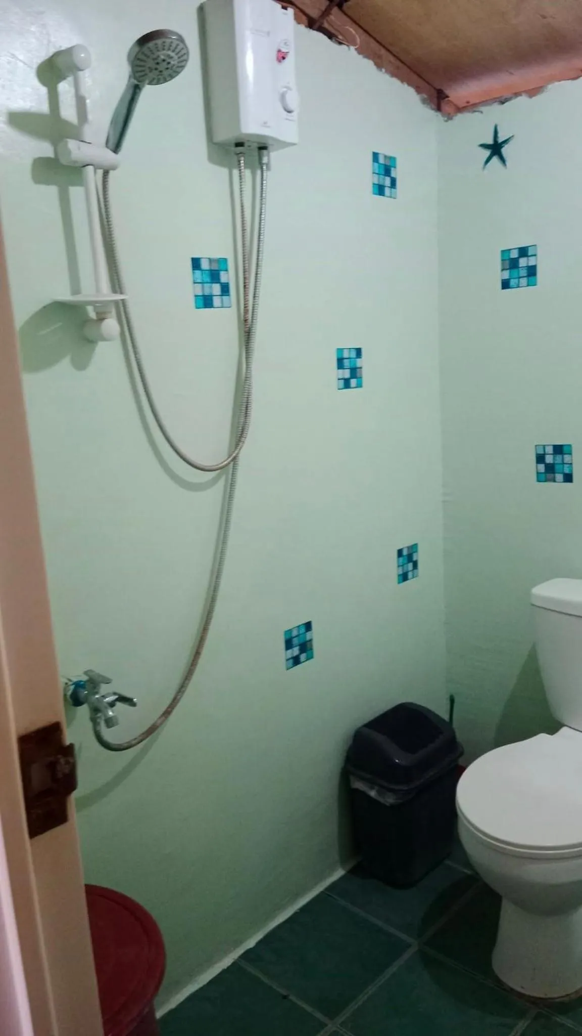 Shower in Titanic's Nipa Hut