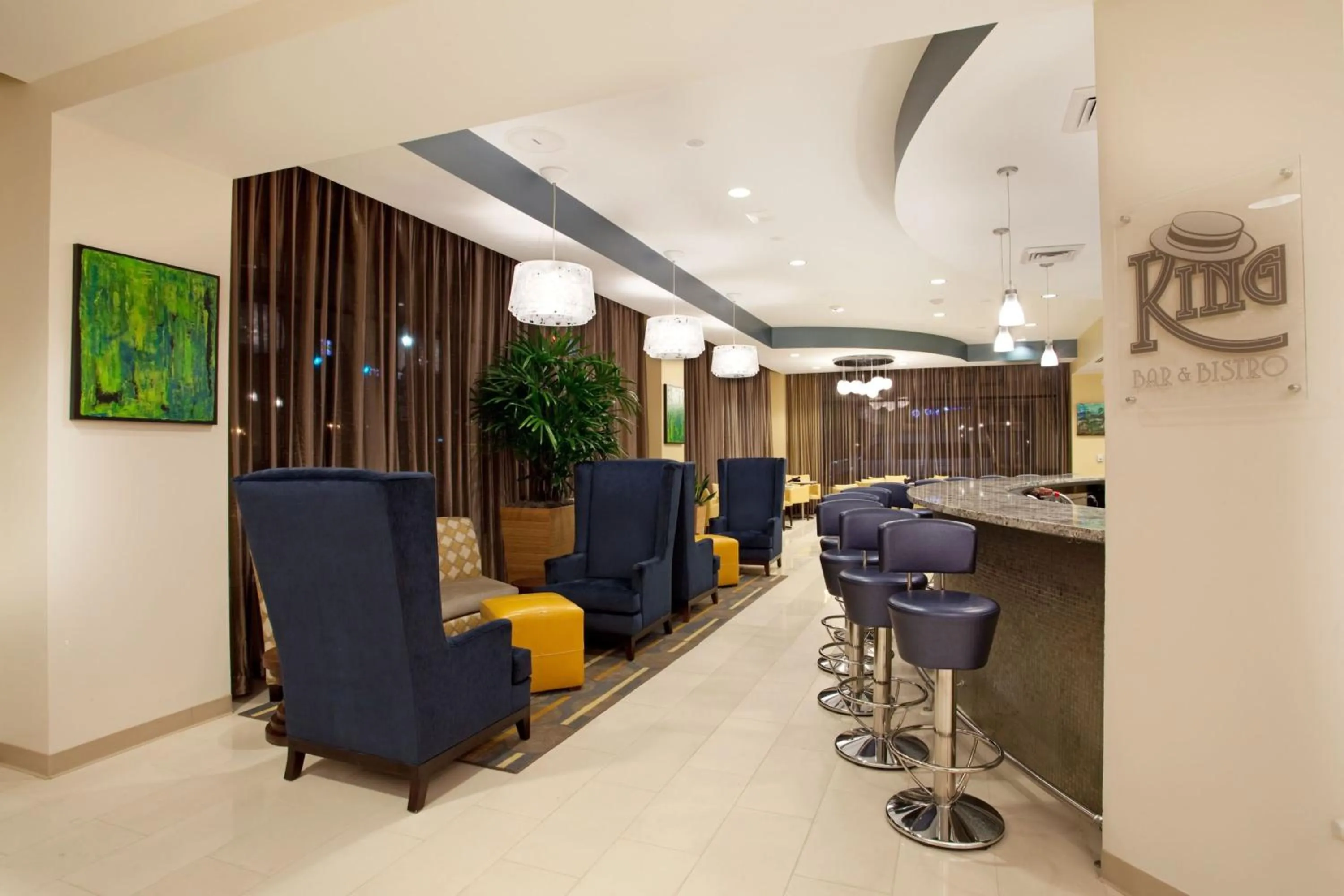 Lounge or bar in Hotel Indigo Baton Rouge Downtown by IHG
