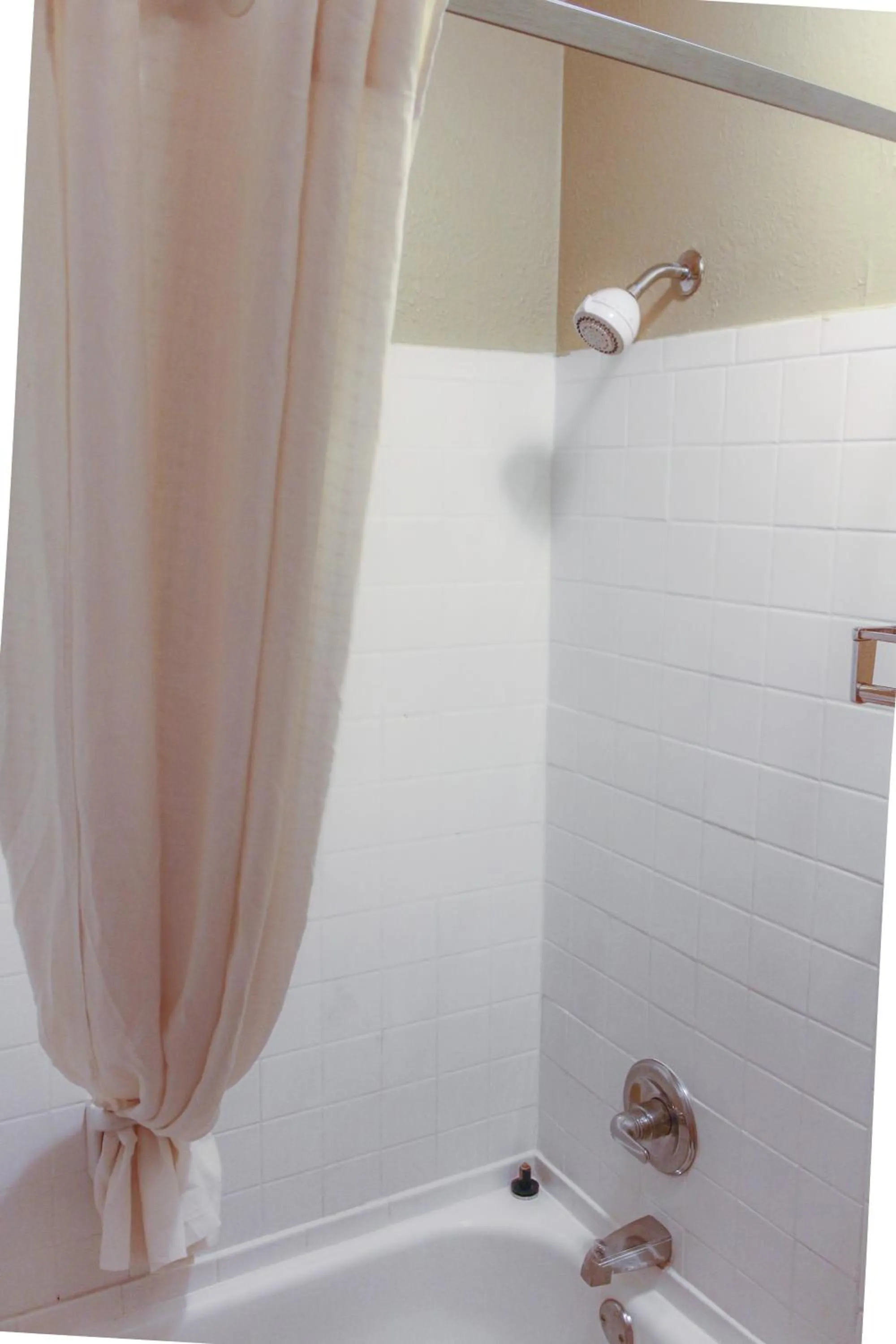 Bathroom in Super 8 by Wyndham College Park/Atlanta Airport West