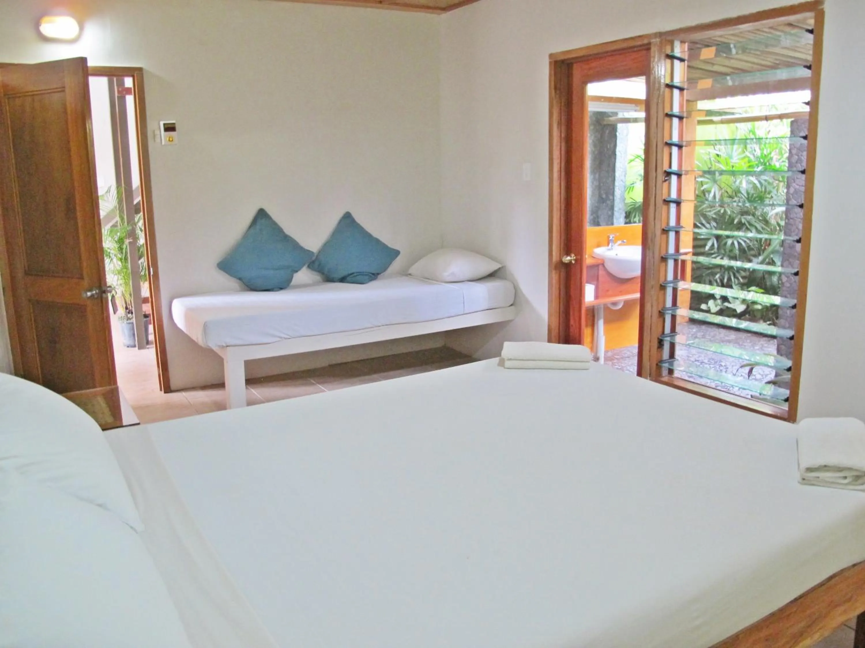 Bed in Beachouse Resort