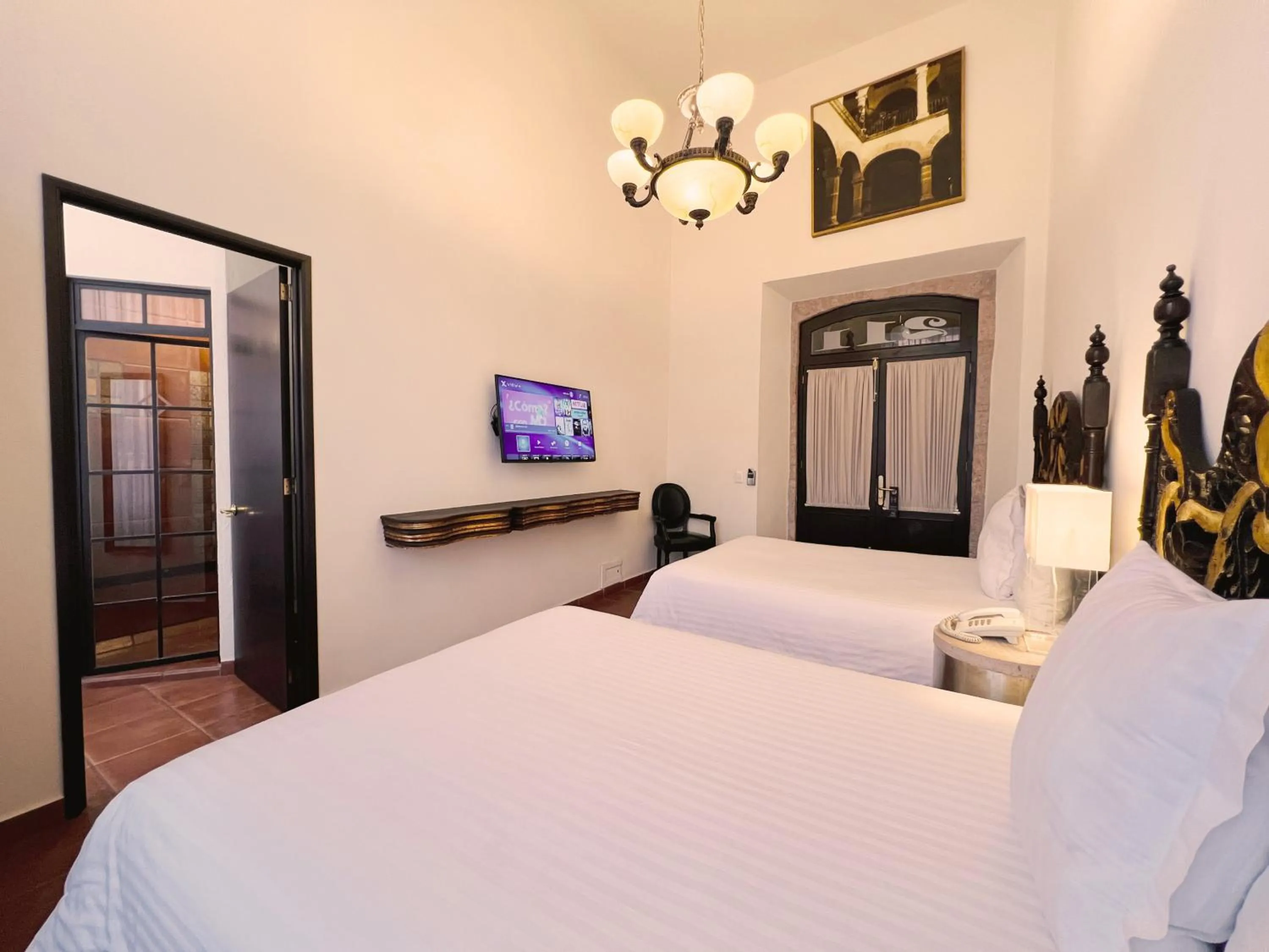 Photo of the whole room, Bed in Hotel Herencia By Hosting House