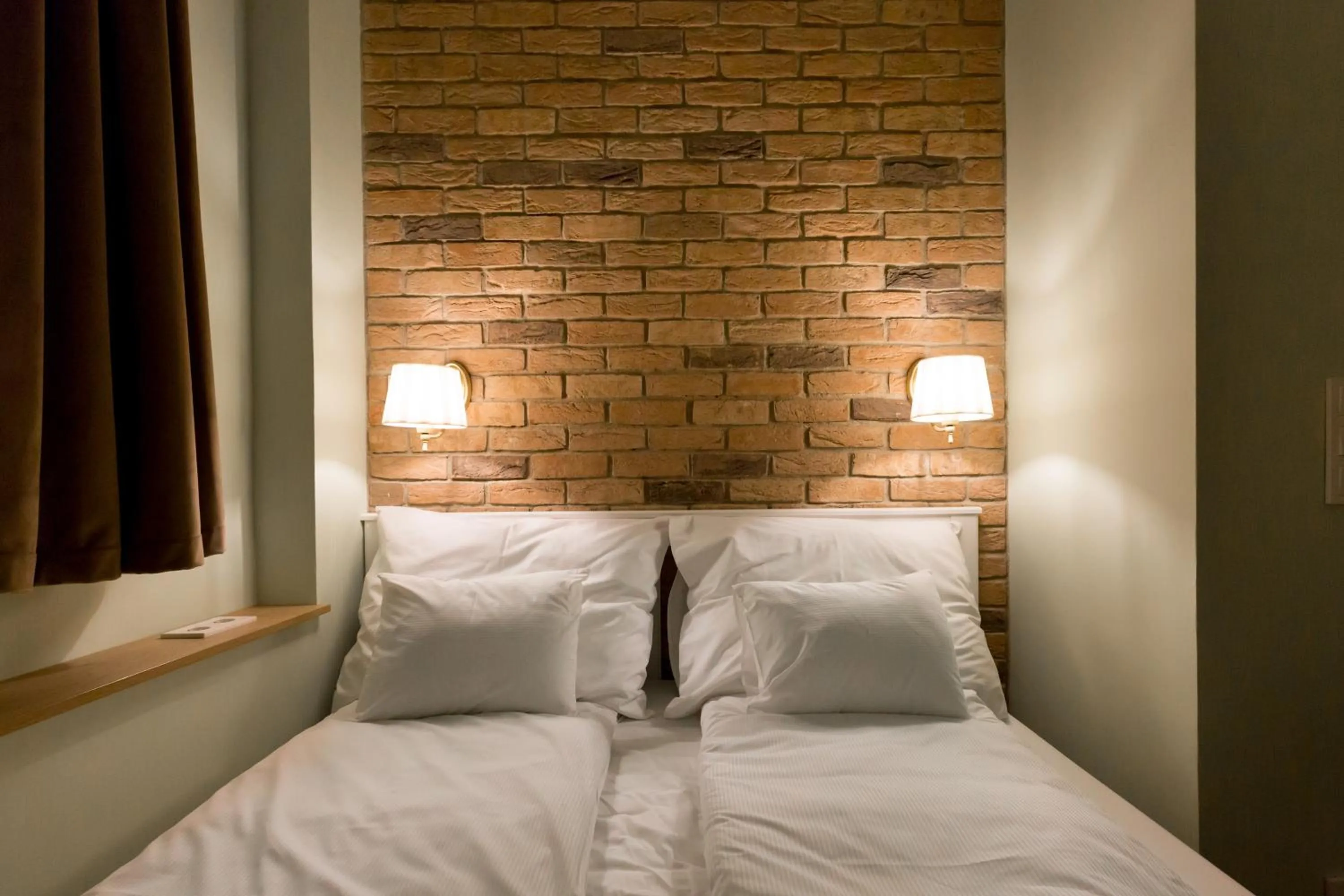 Bedroom in Roland Apartments