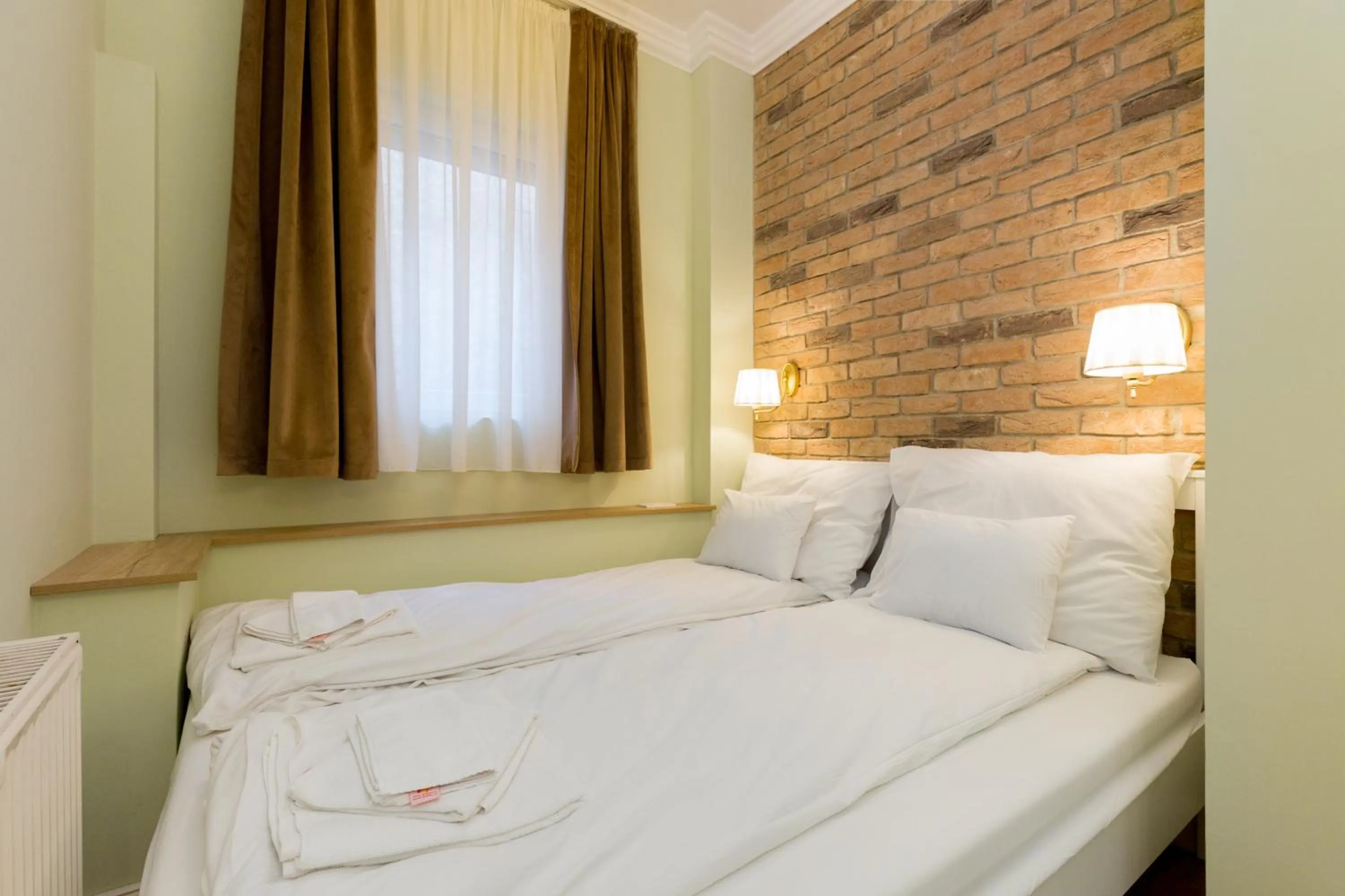 Bedroom in Roland Apartments