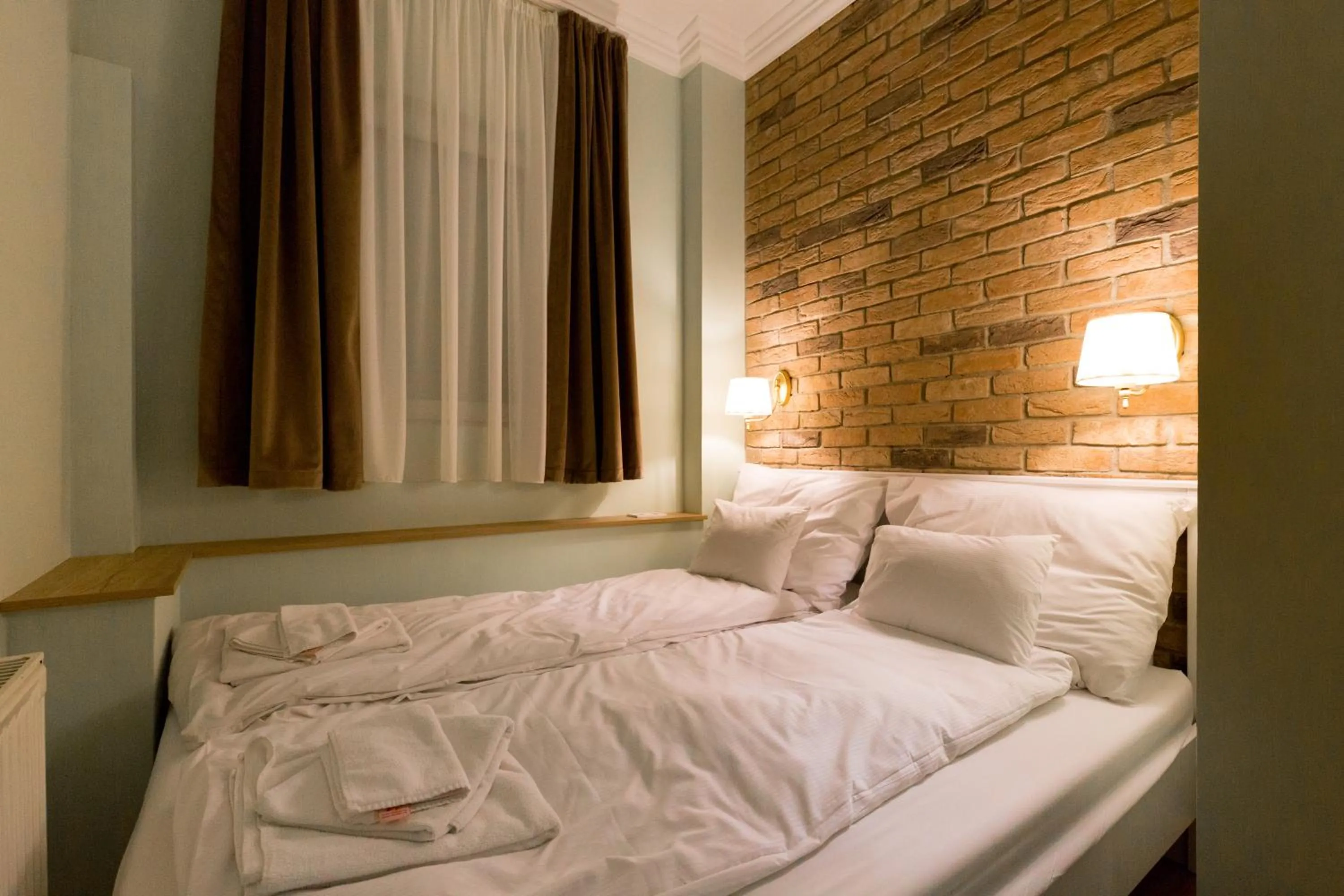 Bedroom in Roland Apartments