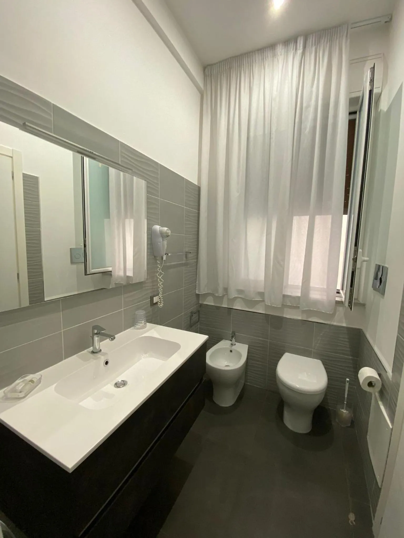 Bathroom in Amuri Room&Suite