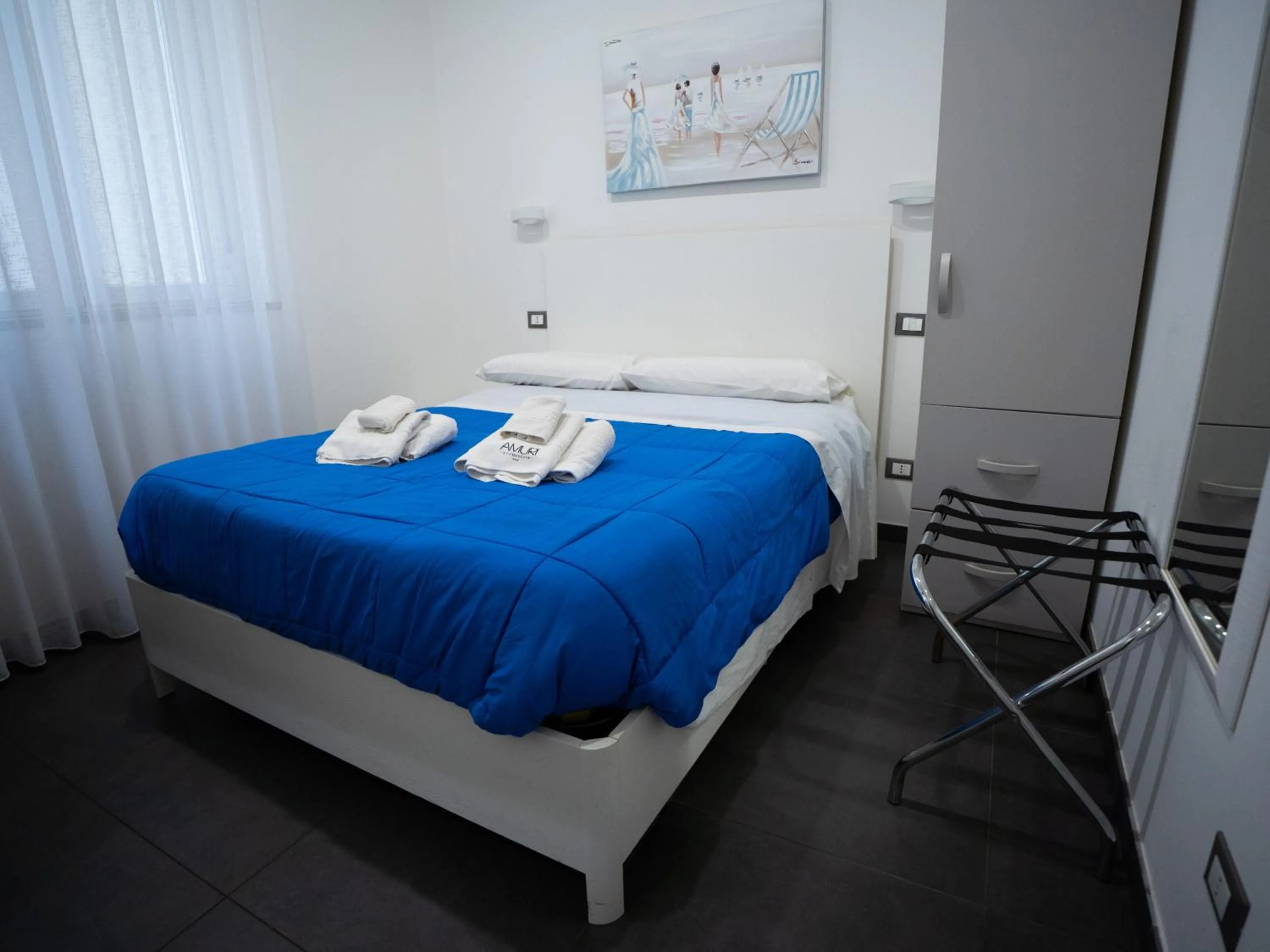 Bed in Amuri Room&Suite