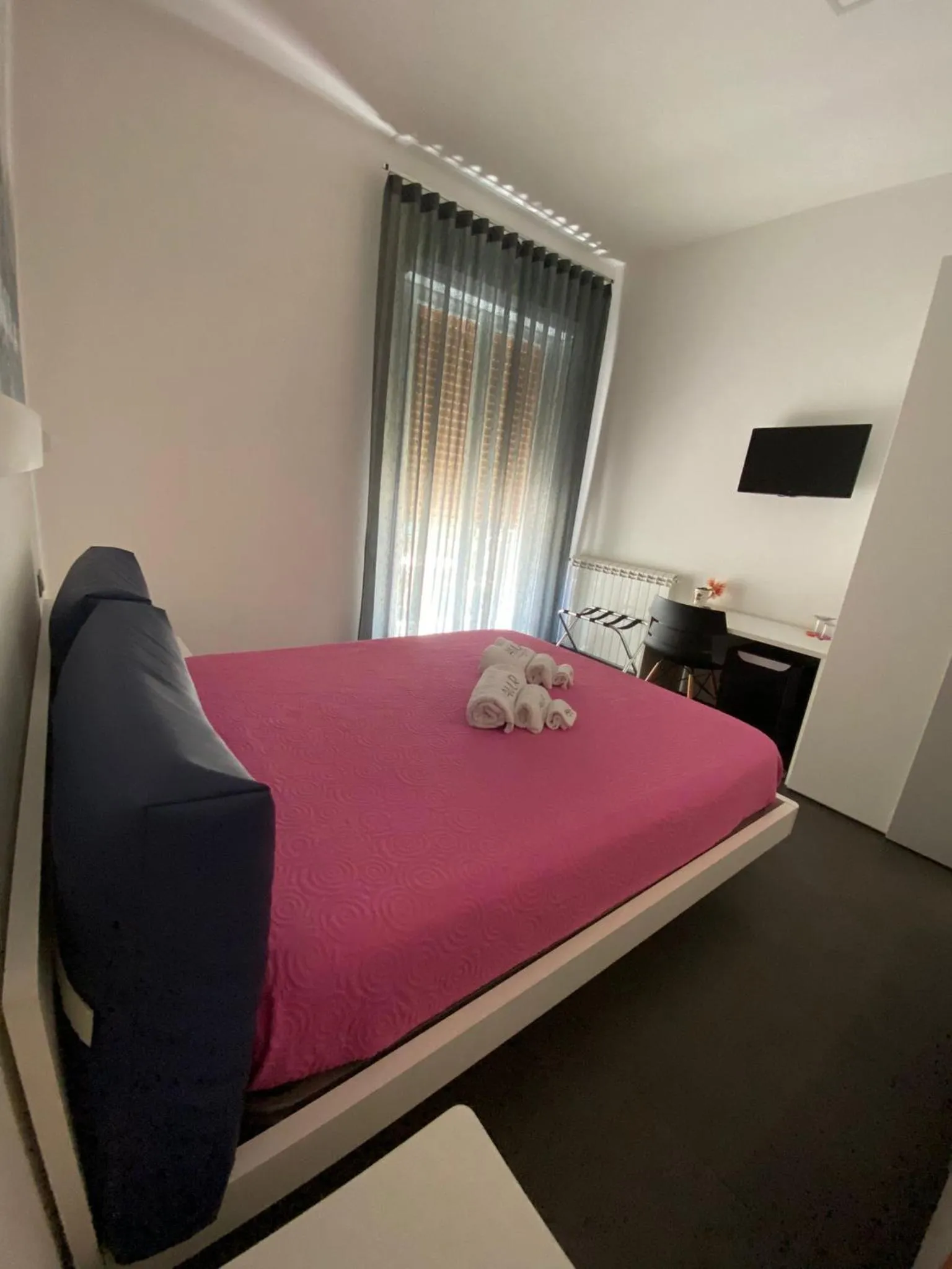 Bed in Amuri Room&Suite