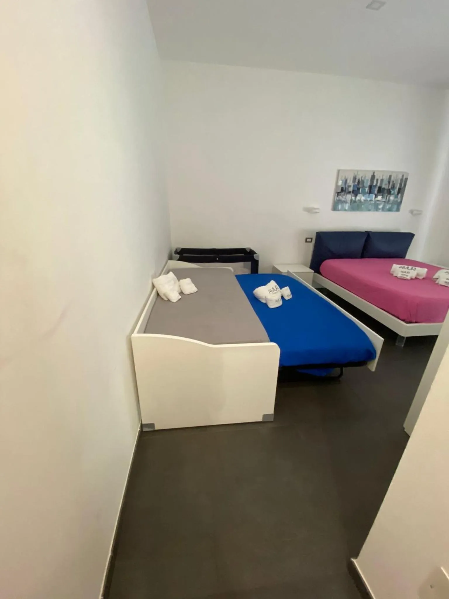 Bed in Amuri Room&Suite