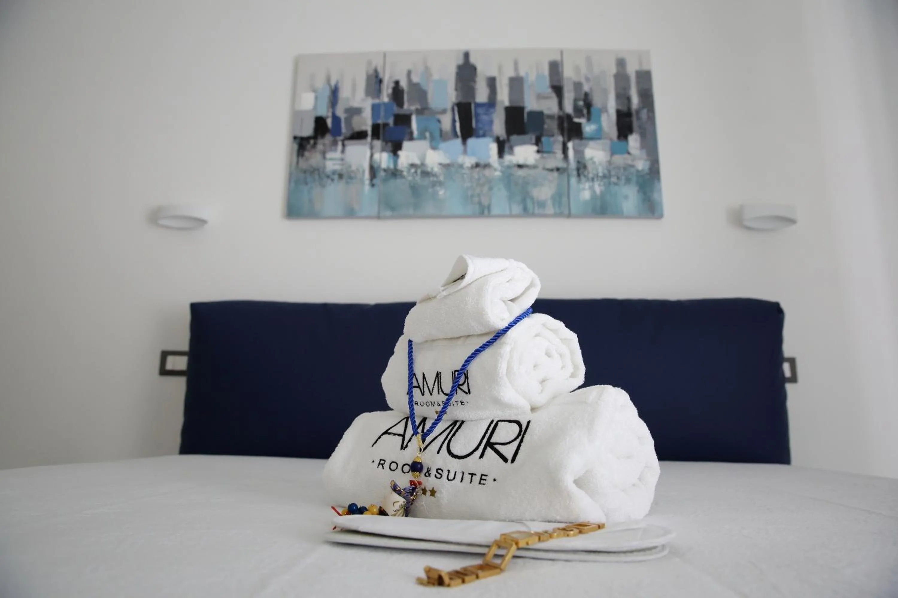 Bed in Amuri Room&Suite