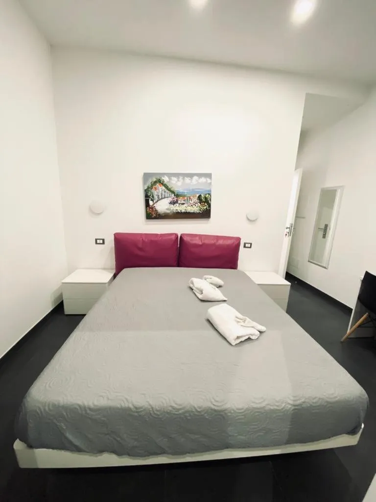 Bed in Amuri Room&Suite