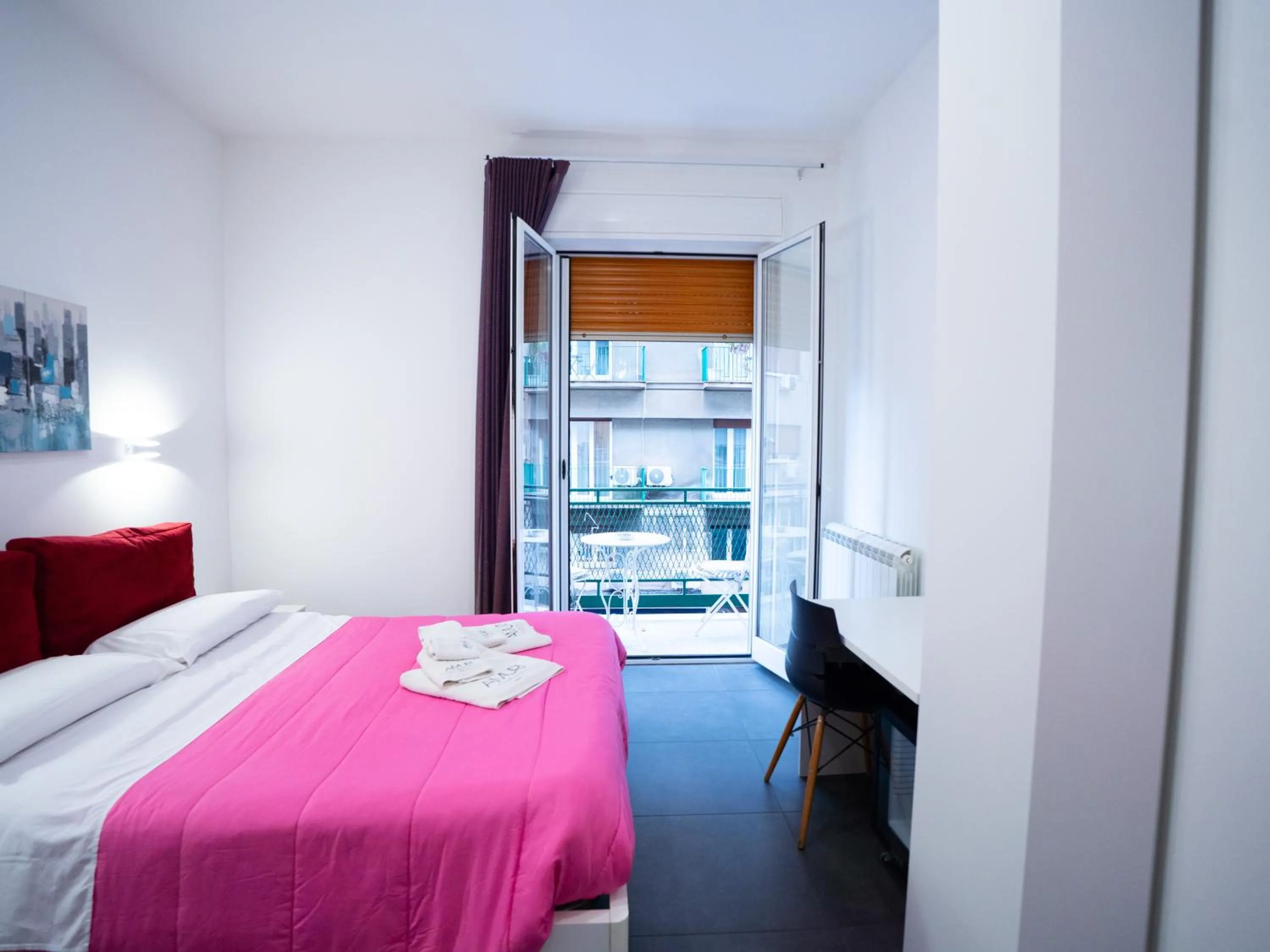 Bed in Amuri Room&Suite