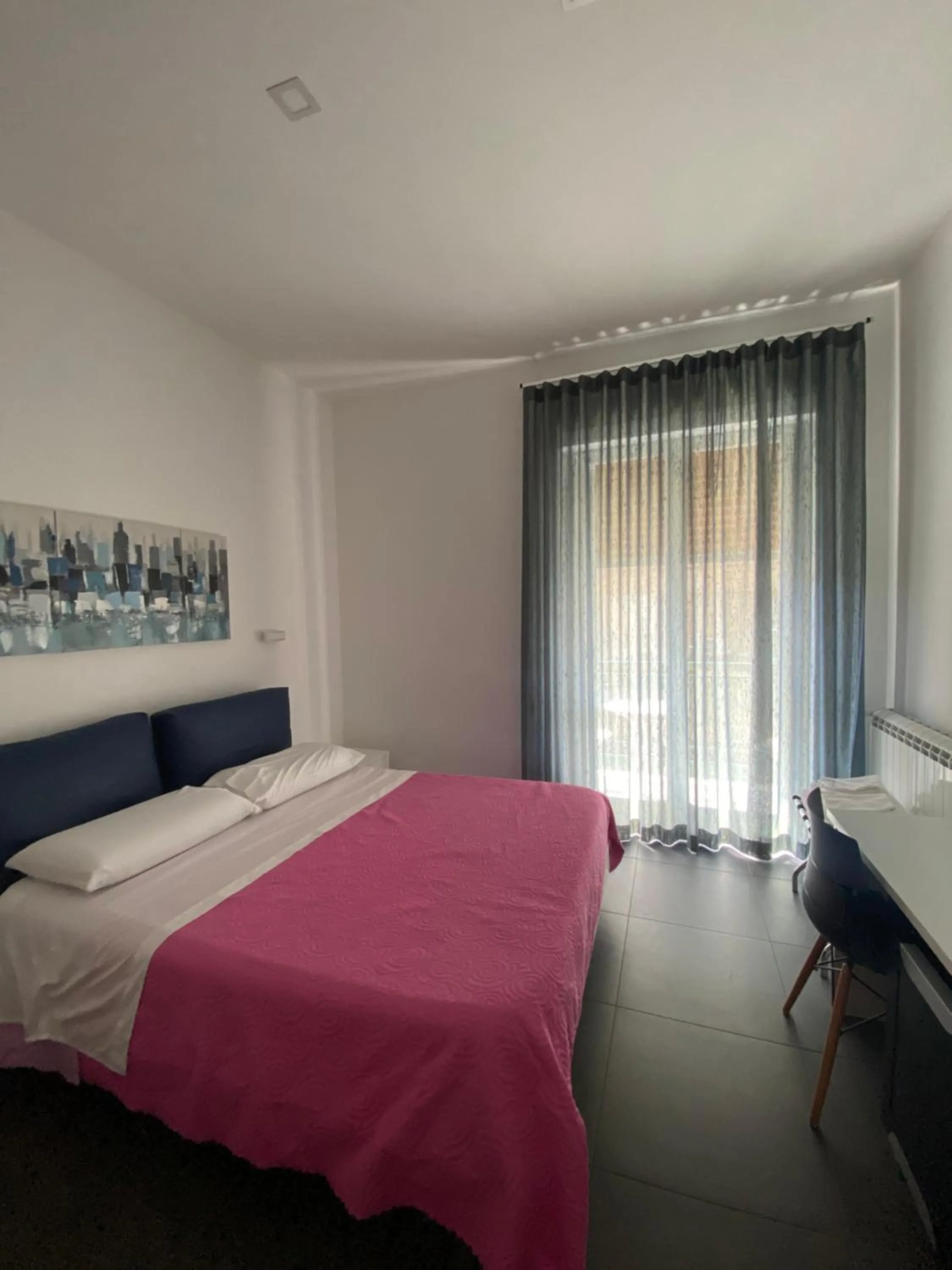 Bed in Amuri Room&Suite