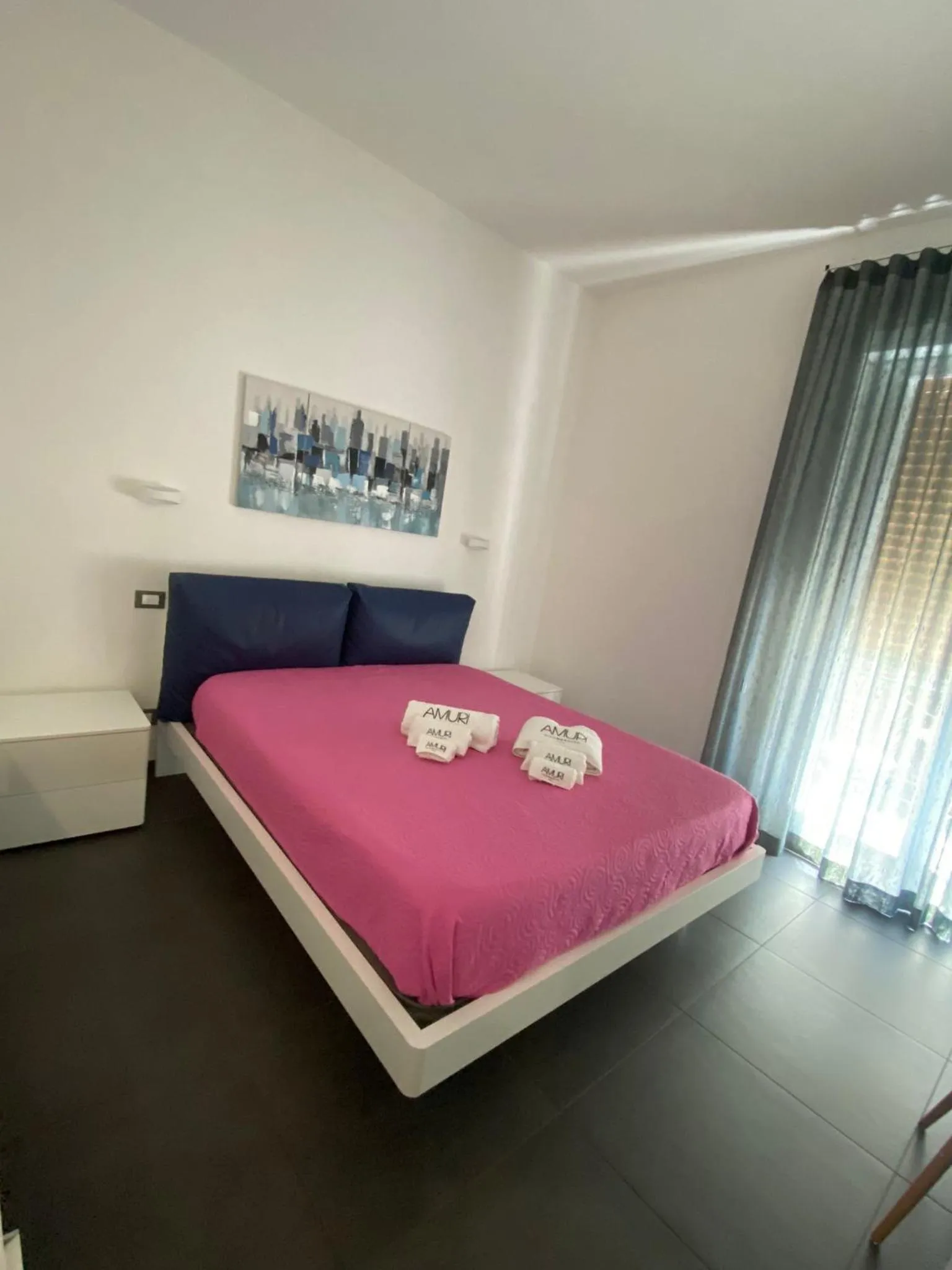 Bed in Amuri Room&Suite