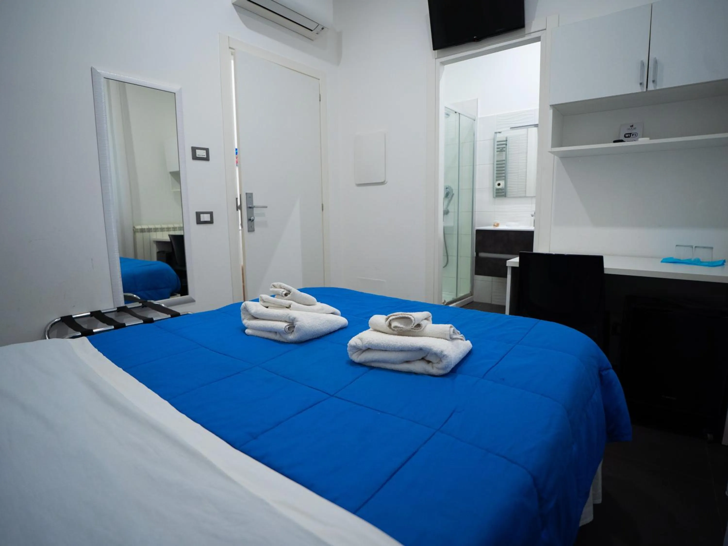 Bed in Amuri Room&Suite