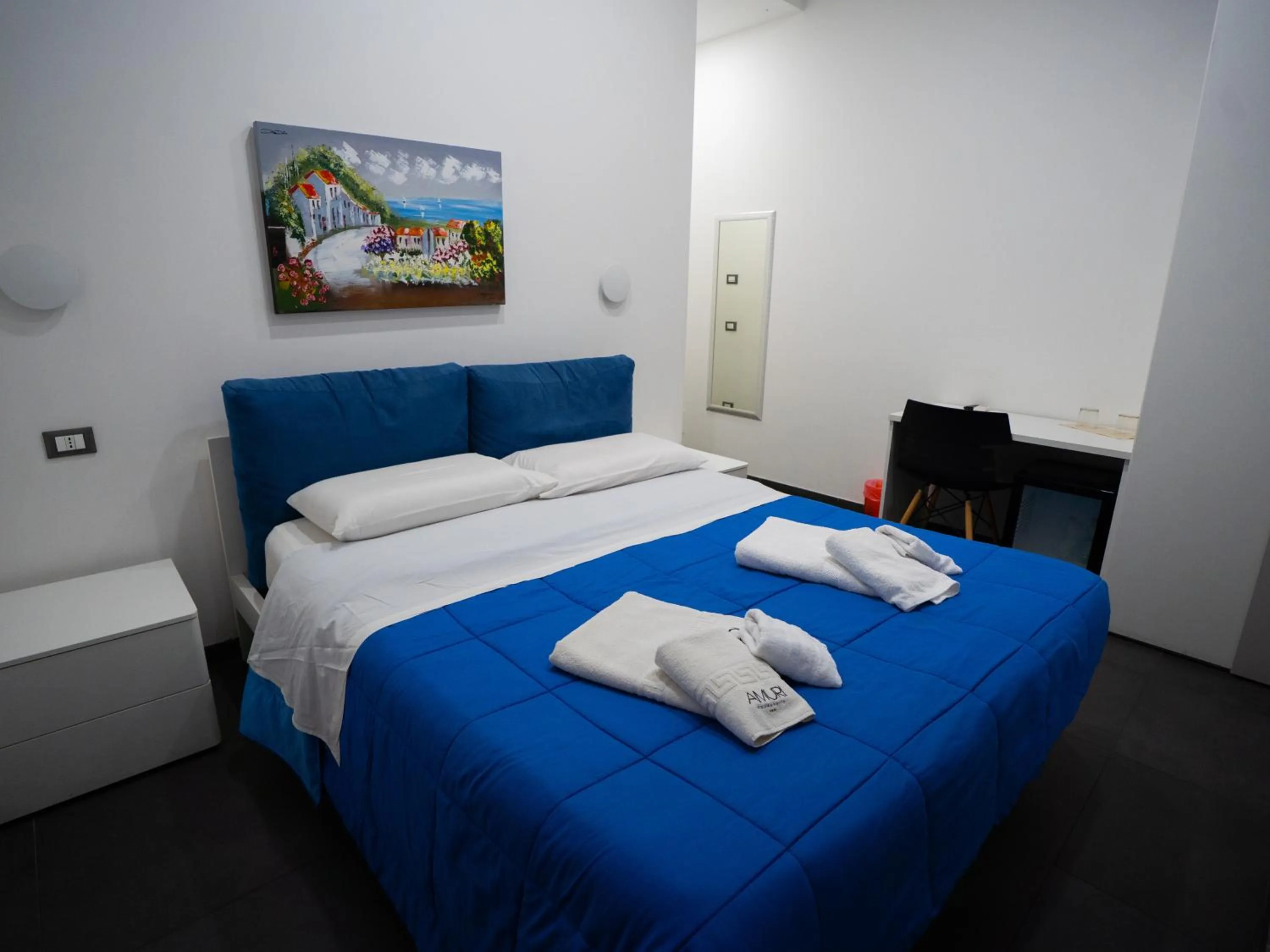 Bed in Amuri Room&Suite