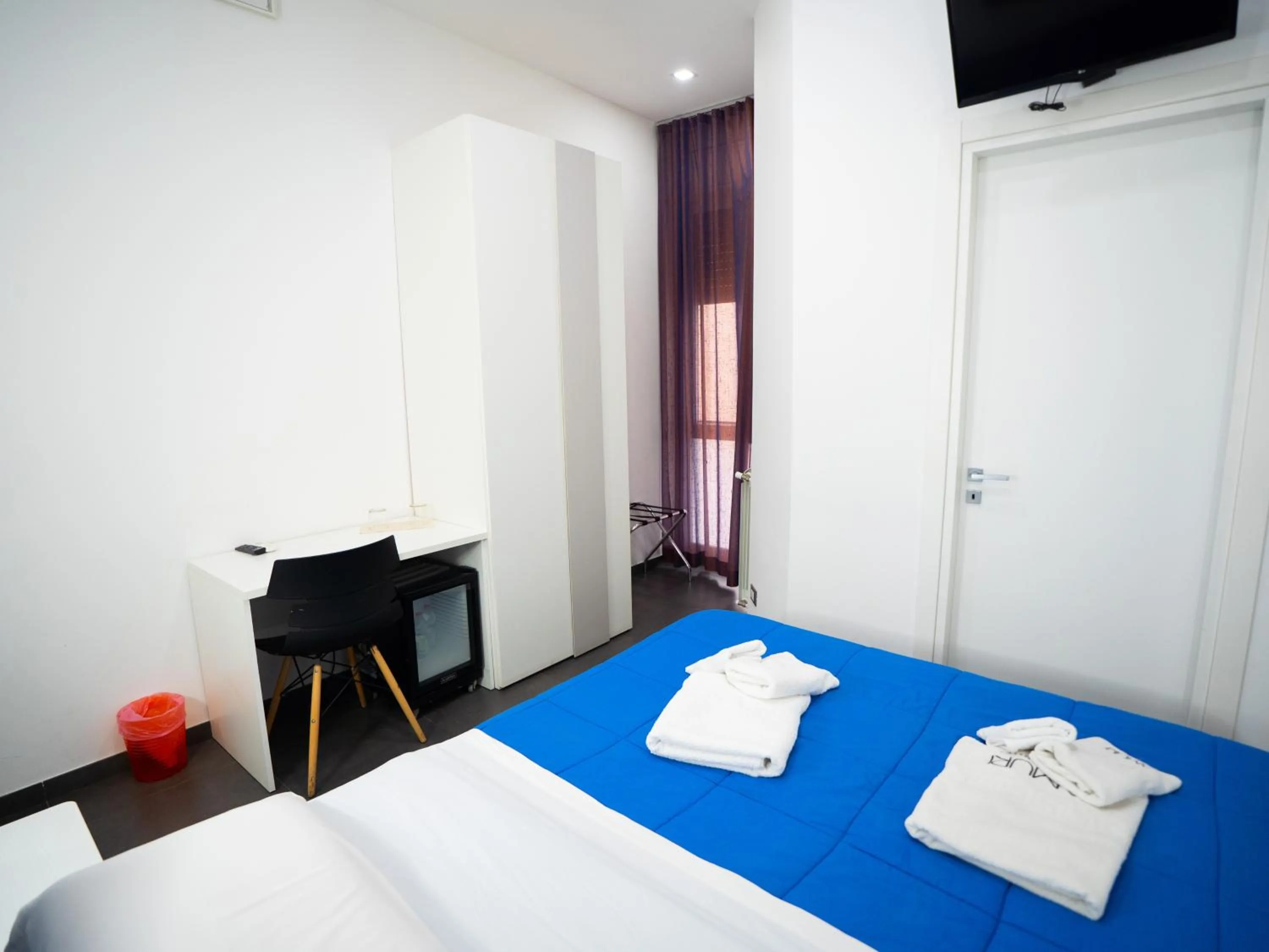 Bed in Amuri Room&Suite