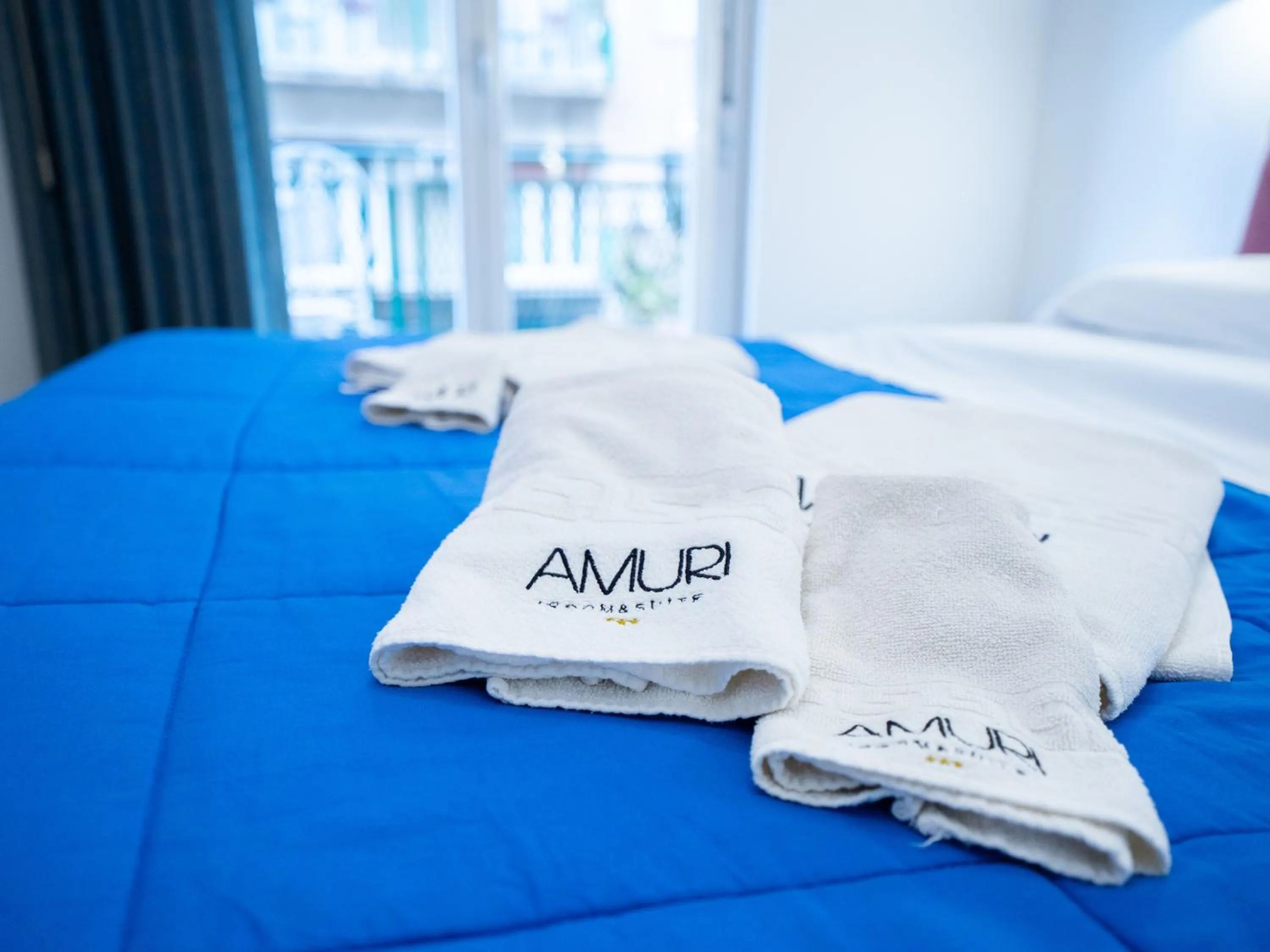 Bed in Amuri Room&Suite