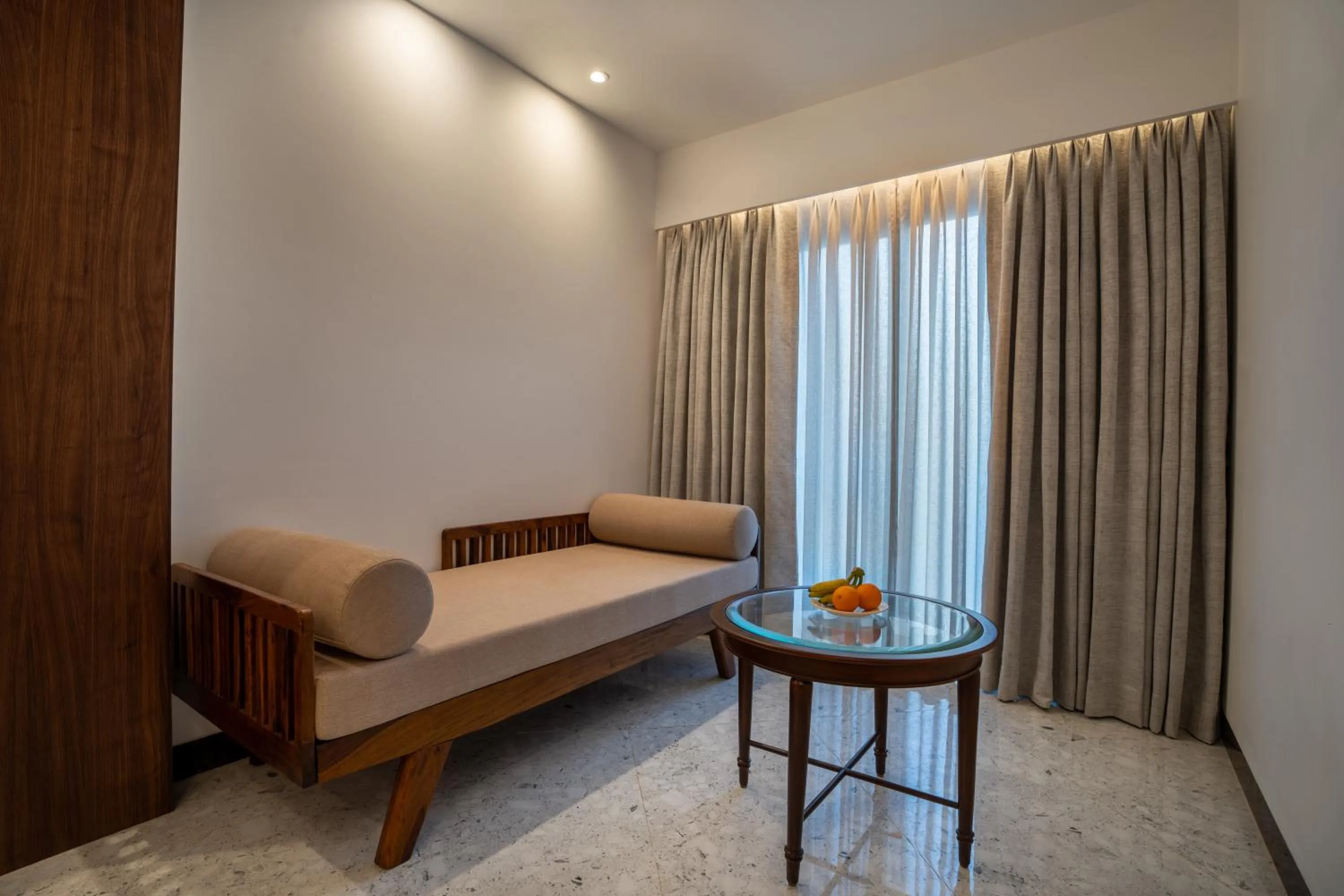 Seating area, Bed in Kenilworth Resort & Spa, Goa