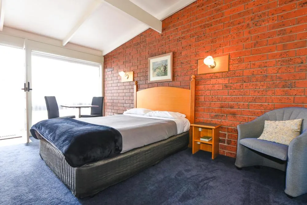 Bed in Abbotswood Motor Inn