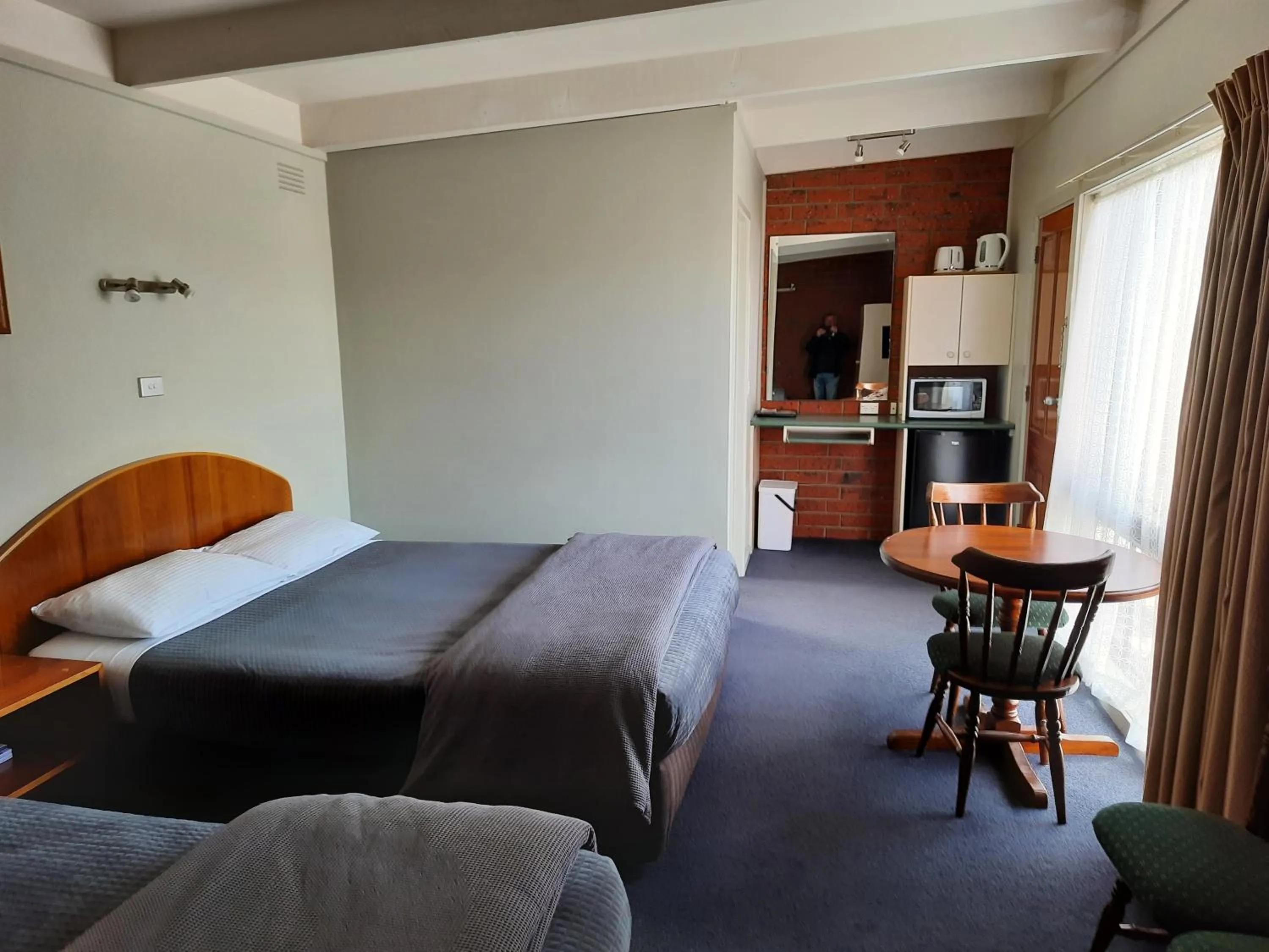 Bed in Abbotswood Motor Inn