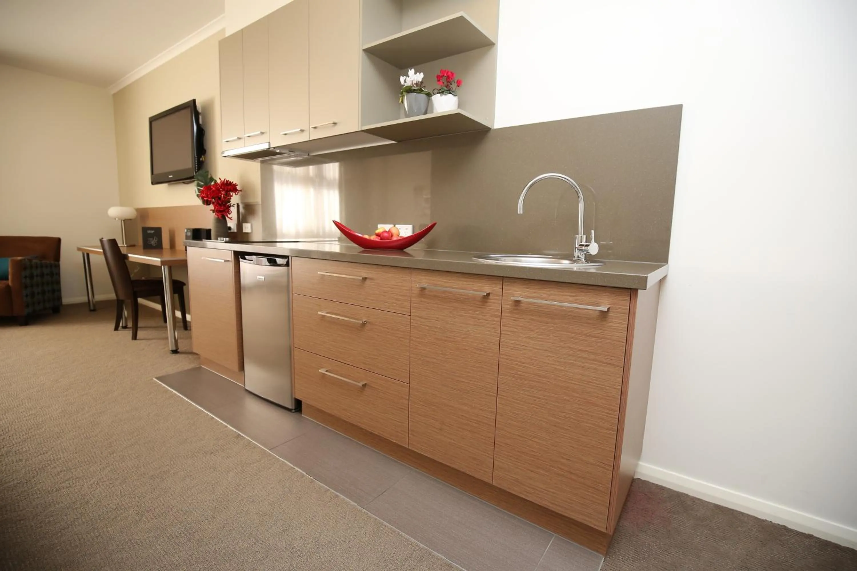 Kitchen or kitchenette in Indulge Apartments - Ontario